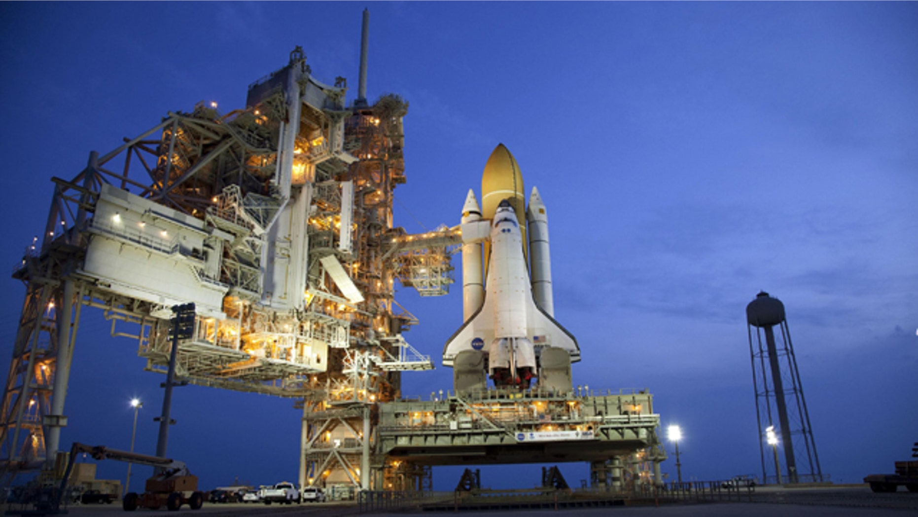 Space shuttle Atlantis stands on Launch Pad 39A at NASA's Kennedy Space Center in Florida, where it is set to liftoff on STS-135, the final shuttle mission.