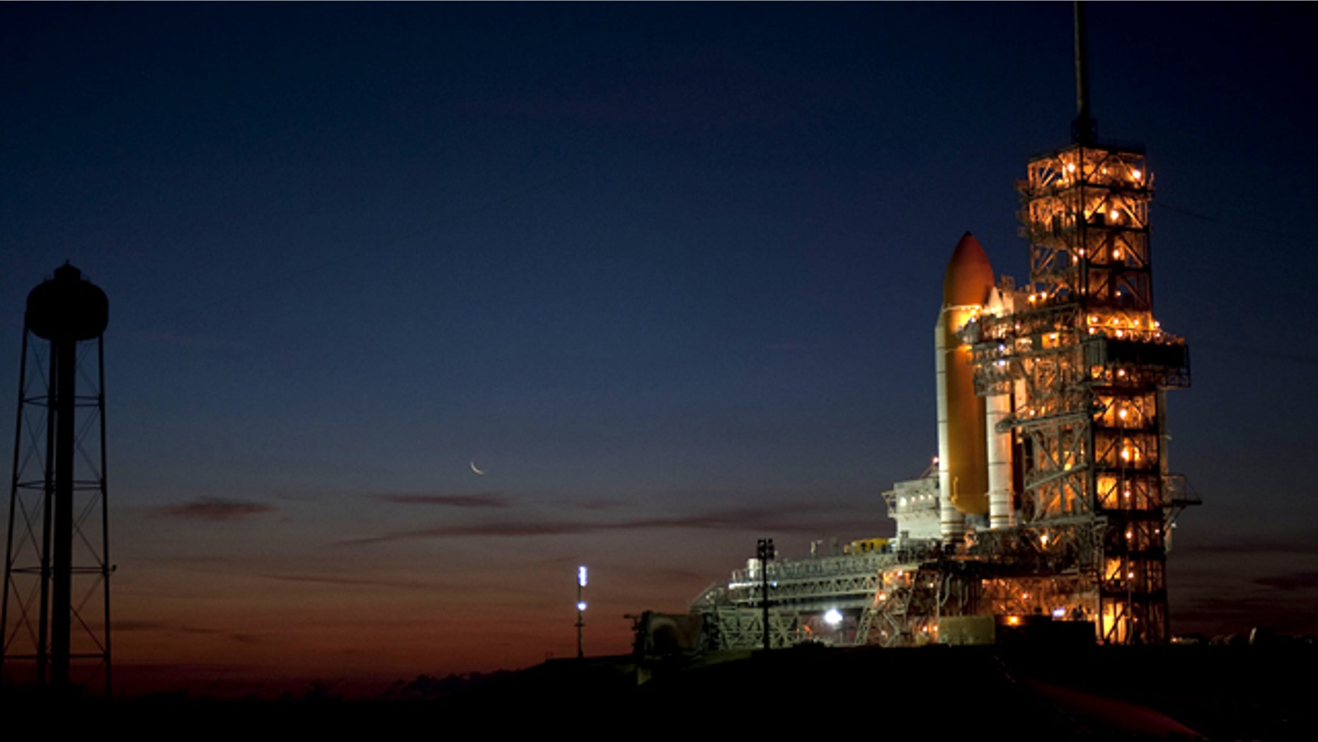 Space shuttle Discovery stands at Launch Pad 39A at NASA's Kennedy Space Center on Feb. 1, 2011 following its rollout from the Vehicle Assembly Building. The shuttle is due to launch on its final mission on Feb. 24.