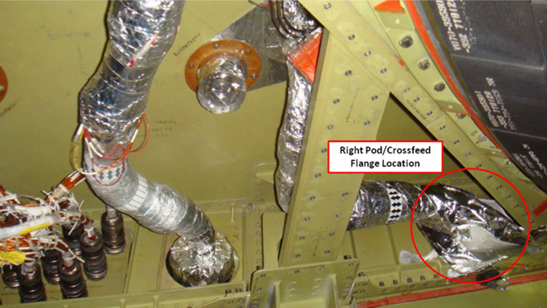 This photo released by NASA shows the connecting point in a fuel line, labeled and circled by NASA, which had been leaking on space shuttle Discovery's right-side orbiter maneuvering system engine.