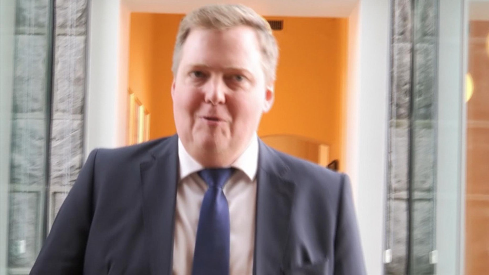 April 5, 2016: In this grab taken from video, Iceland's Prime Minister Sigmundur David Gunnlaugsson leaves after holding a meeting at Iceland's Parliament in Reykjavik.