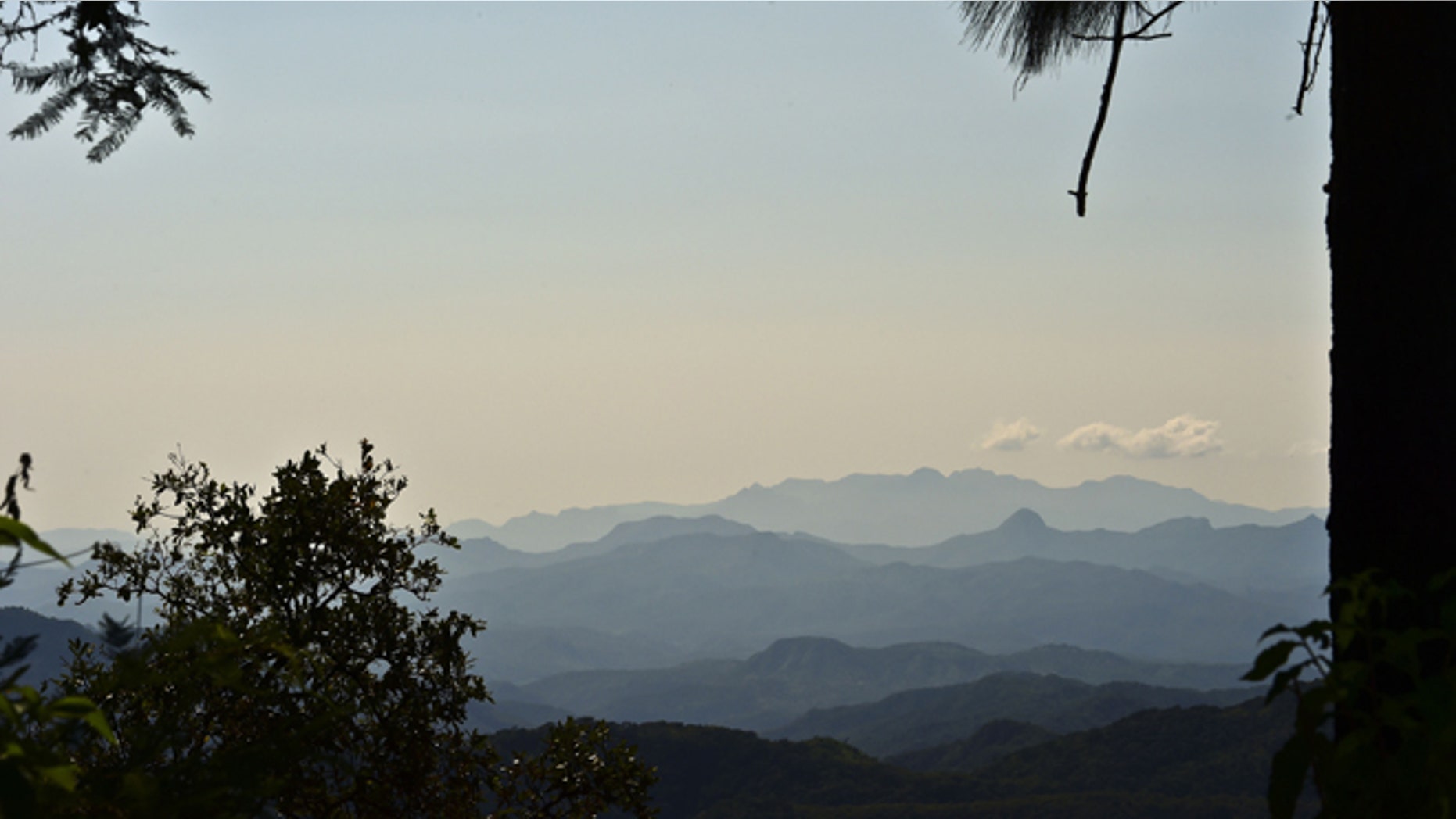 Picture taken at Mexico's Sierra Madre Occidental mountain range -- the bastion of Joaquin "El Chapo" Guzman's Sinaloa drug cartel -- near El Limon, in Durango State, on October 18, 2015. Bullet holes on roofs, charred cars and deserted villages were left in the wake of a military operation to catch fugitive drug baron Joaquin "El Chapo" Guzman in northwest Mexico. AFP PHOTO / RONALDO SCHEMIDT (Photo credit should read RONALDO SCHEMIDT/AFP/Getty Images)