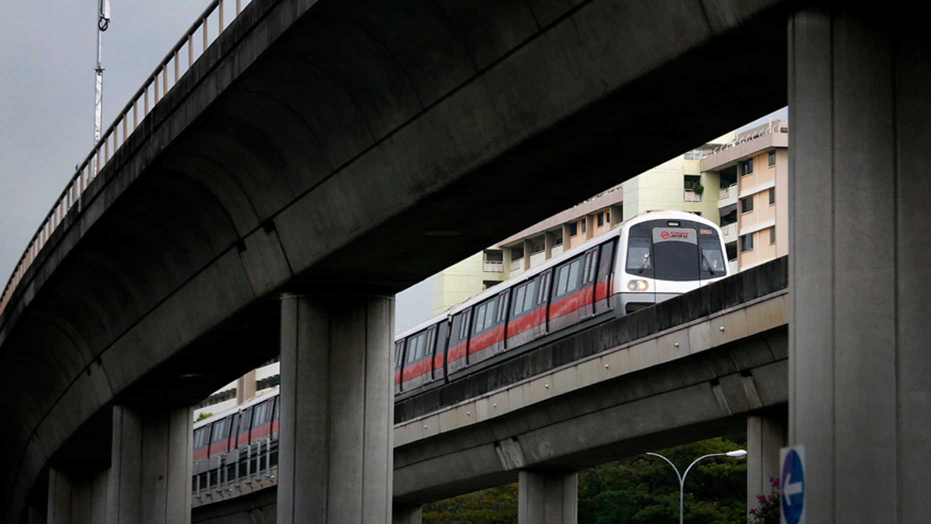 March 22, 2016: A train runs on an overhead track in Singapore.