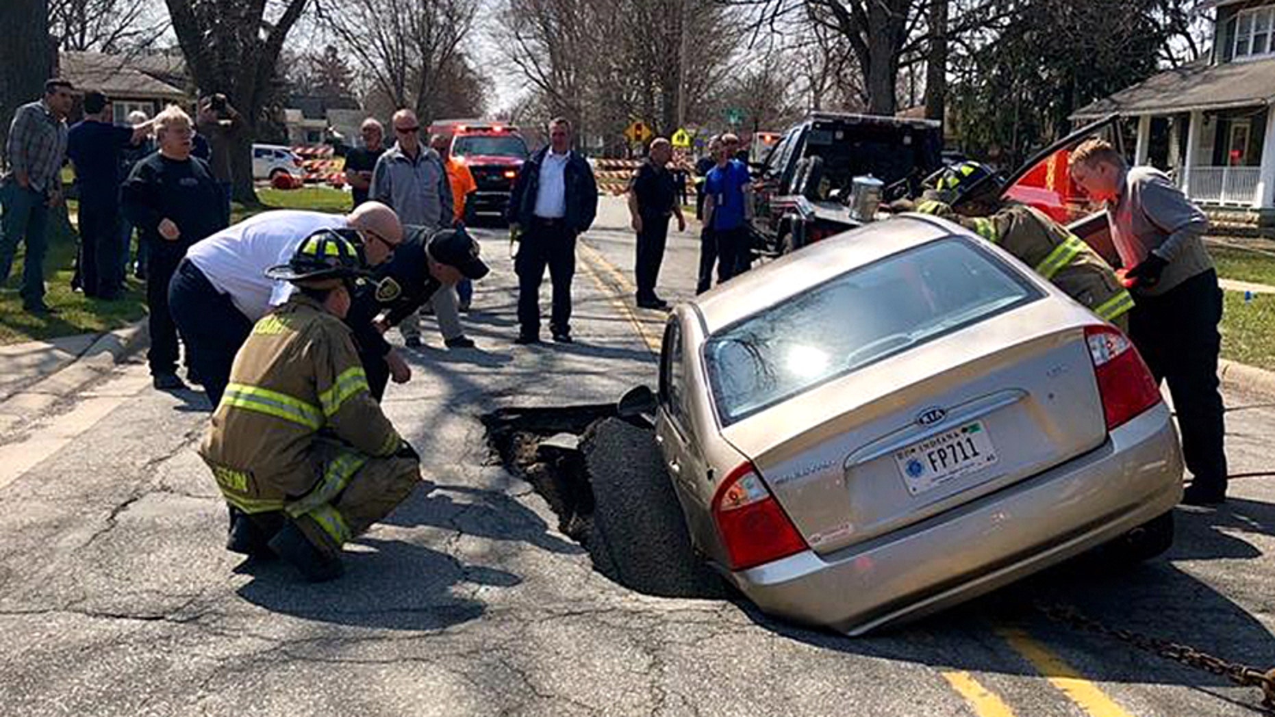 A car ended up in a large sinkhole in northwest Indiana on Wednesday.