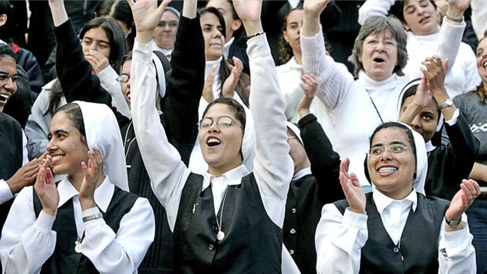 Little Sisters of the Poor cheering.