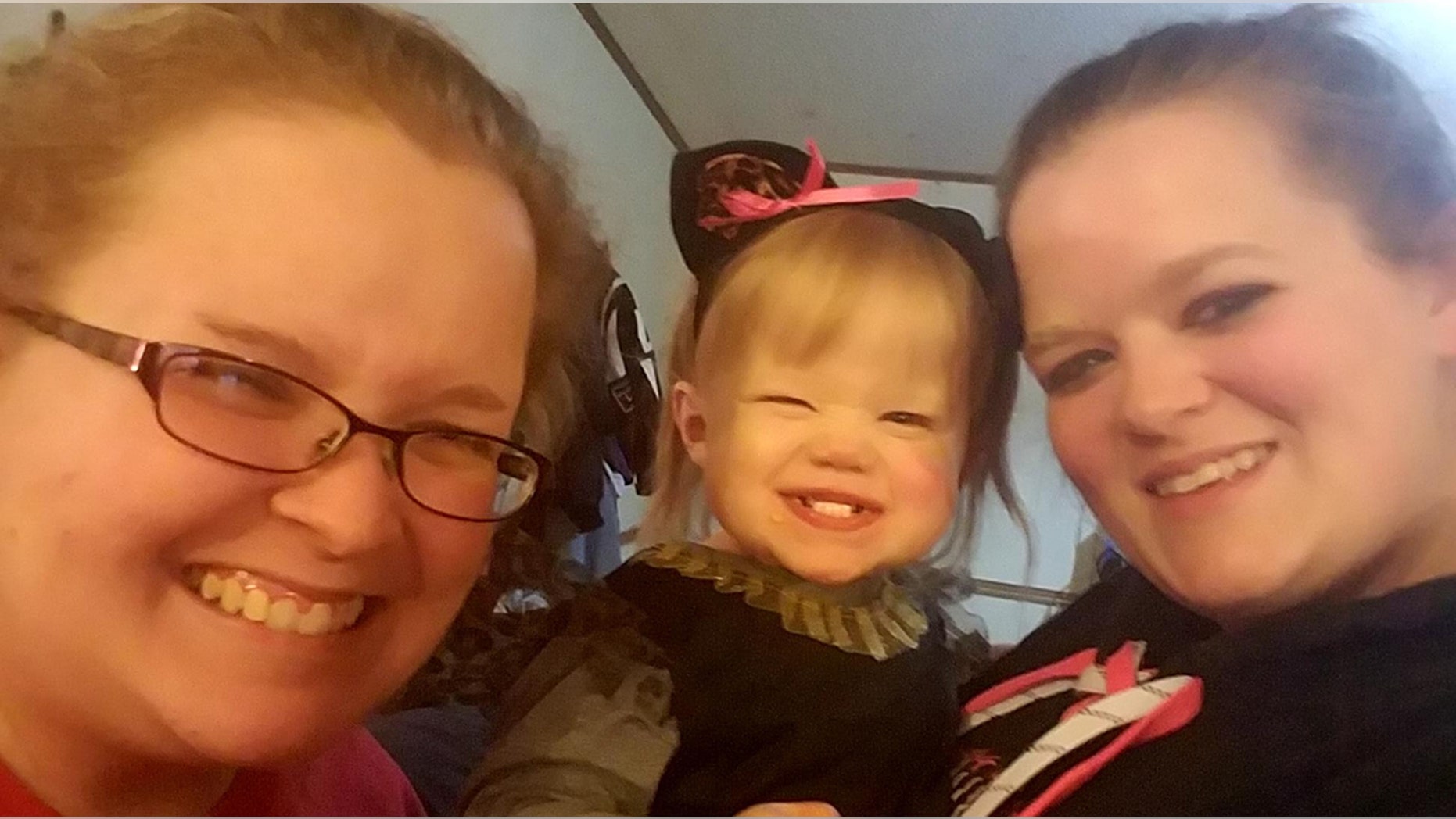 Collect photo of Tasha Baldwin, 25, Karley ,2, and her mother Katrina Baldwin, 27. Katrina Baldwin and her sister Tasha Baldwin both contracted the immensely rare moyamoya disorder- blocked arteries in the brain. They are recovering together after brain surgery. Baudette, Minnesota, USA See story NYSISTERS .Two sisters with the same one-in-a-million disease are recovering side by side after undergoing matching brain surgeries. Tasha Baldwin, 25, and her sister Katrina, 27, have moyamoya, a mystery disorder caused by blocked arteries at the base of the brain. Tasha first experienced symptoms earlier this year when her arm went numb, and doctors later found she had suffered multiple strokes caused by moyamoya. The same day teaching assistant Tasha was diagnosed - January 26 - her older sister Katrina lost the feeling in her arm and her face began to droop.