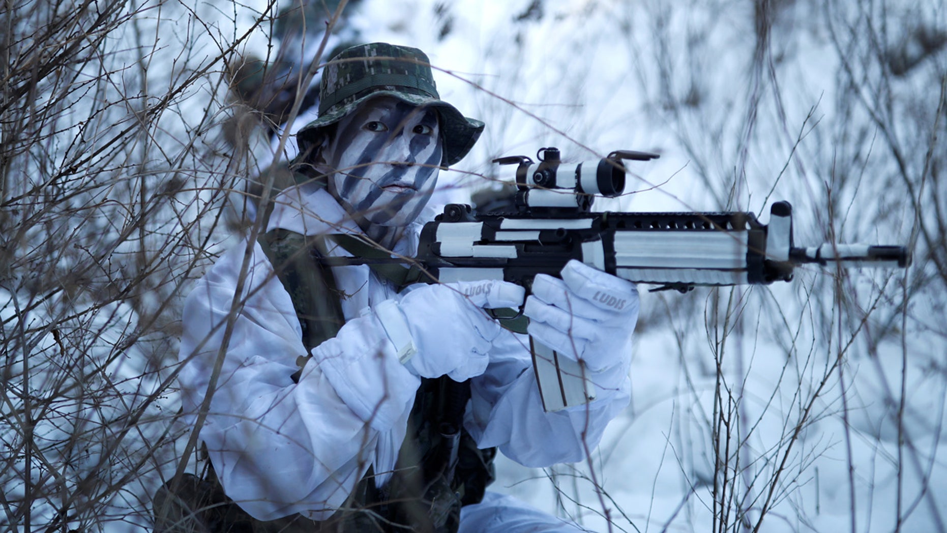 South Korean and U.S. Marines take part in a winter military drill in Pyeongchang, South Korea on Dec. 19.