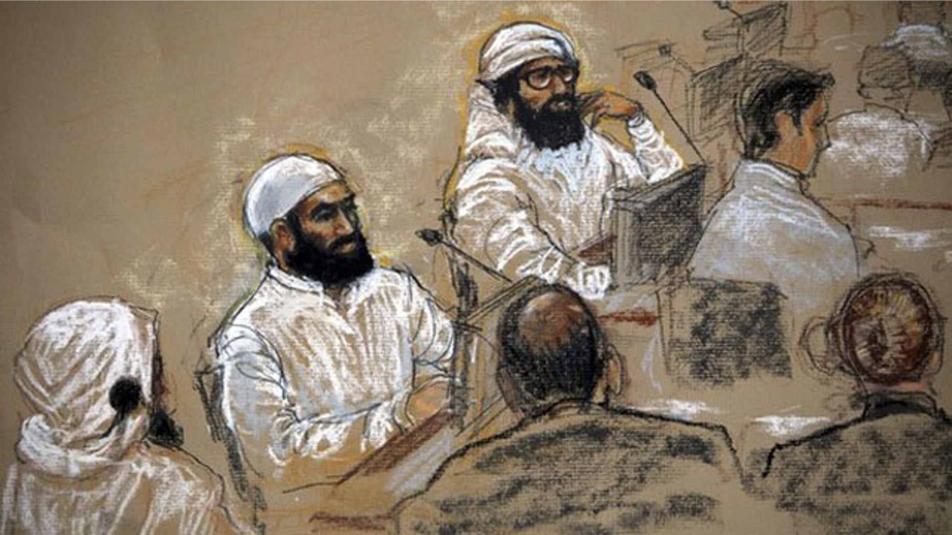In this July 16, 2009 file photo of a sketch by courtroom artist Janet Hamlin, alleged September 11 co-conspirators sit with their legal teams inside the courtroom at Guantanamo Bay. Mustafa al Hawsawi is on the right.