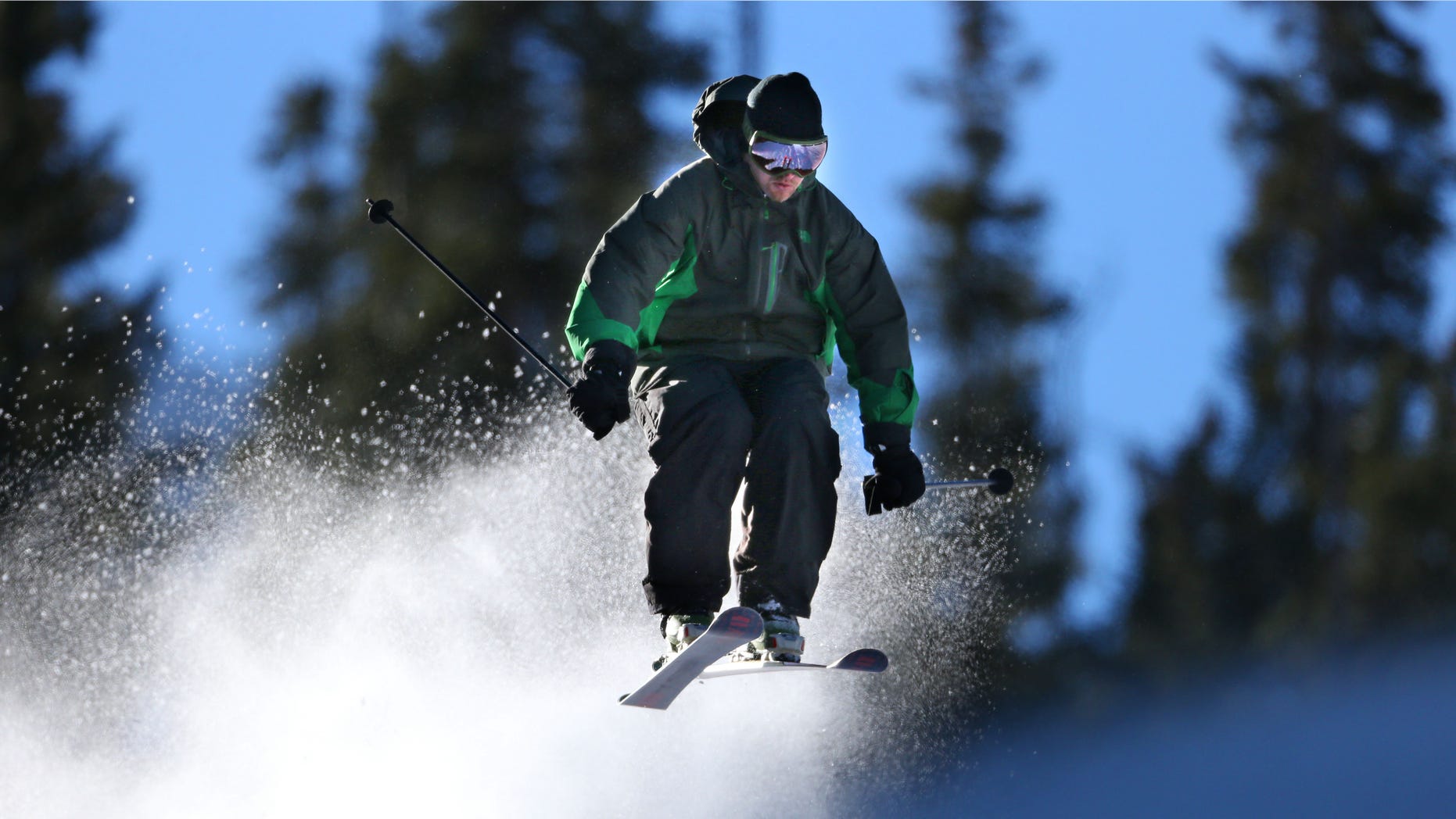 A skier enjoys opening day at Arapahoe Basin Ski Area in Colorado. Colorado Ski Country USA, a trade association that represents 21 resorts, is informing visitors through social media about the new pot laws, which were passed last year and legalize marijuana possession in small amounts for adults over 21, including out-of-state visitors.