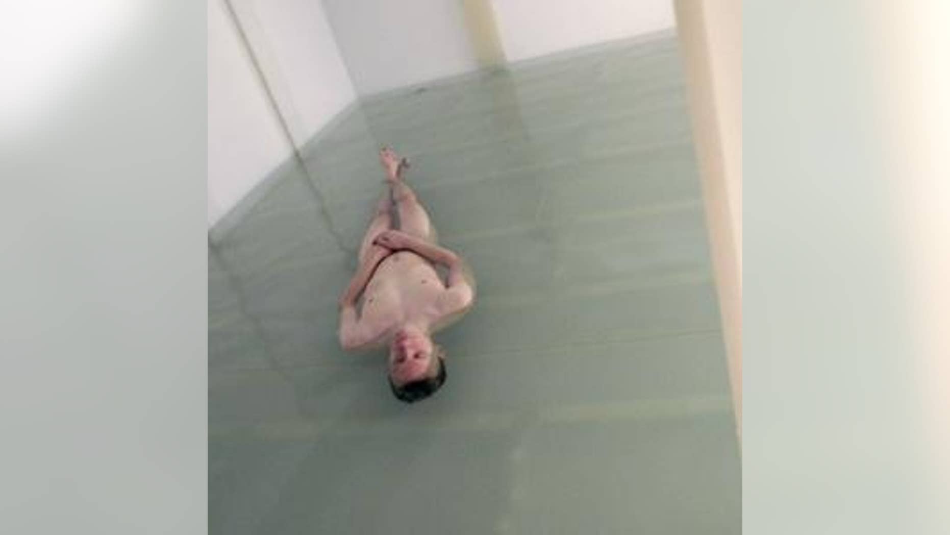Oct. 28, 2011: A New Museum employee in the “Psycho Tank,” a part of an adult art exhibit in New York City.