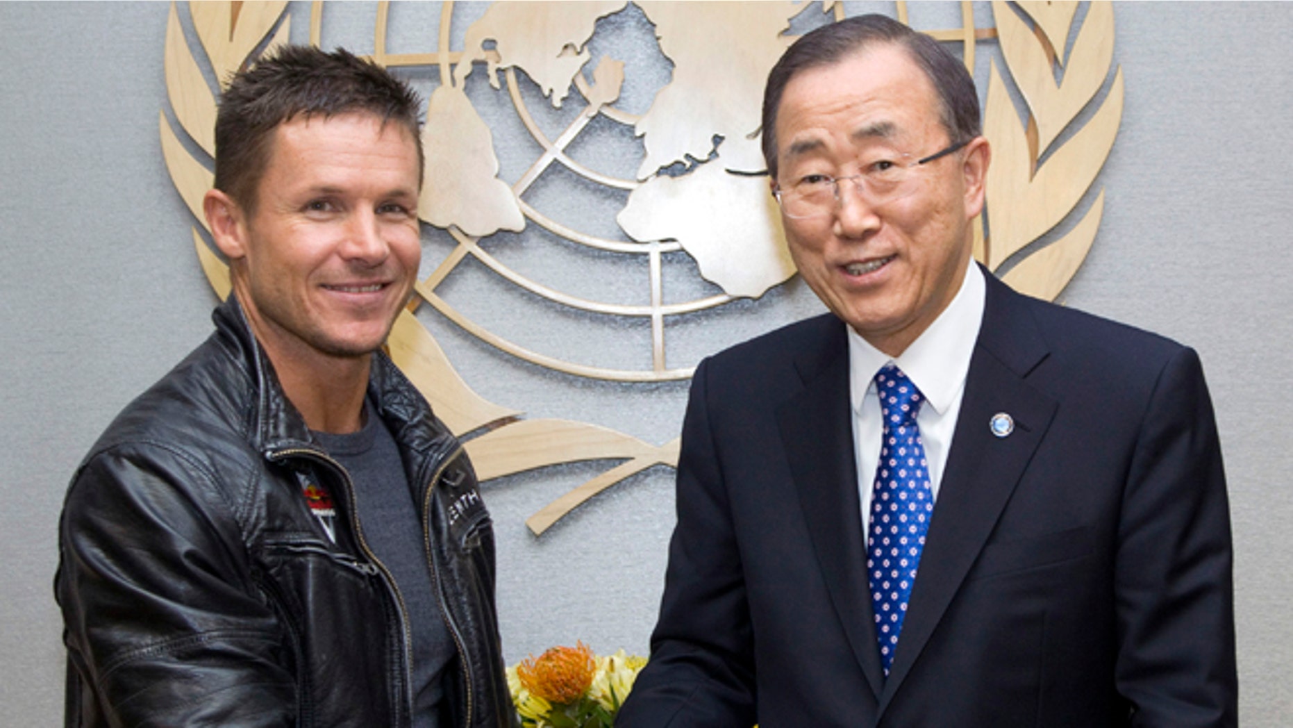 Oct. 23, 2012: In this photo provided by the United Nations, Austrian skydiver, base jumper and daredevil Felix Baumgartner, left, and United Nations Secretary General Ban Ki-moon pose for photographers at United Nations Headquarters.