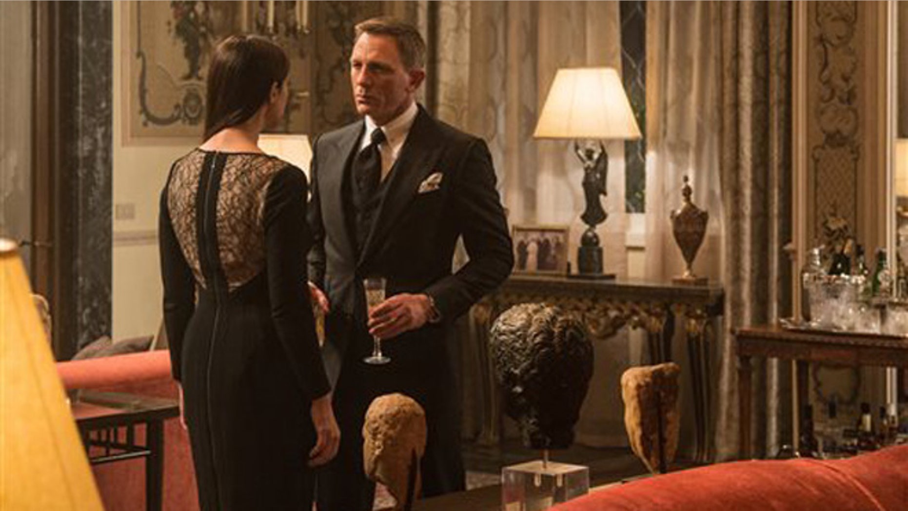 In this image released by Metro-Goldwyn-Mayer Pictures/Columbia Pictures/EON Productions, Monica Bellucci, left, and Daniel Craig appear in a scene from the James Bond film, "Spectre."