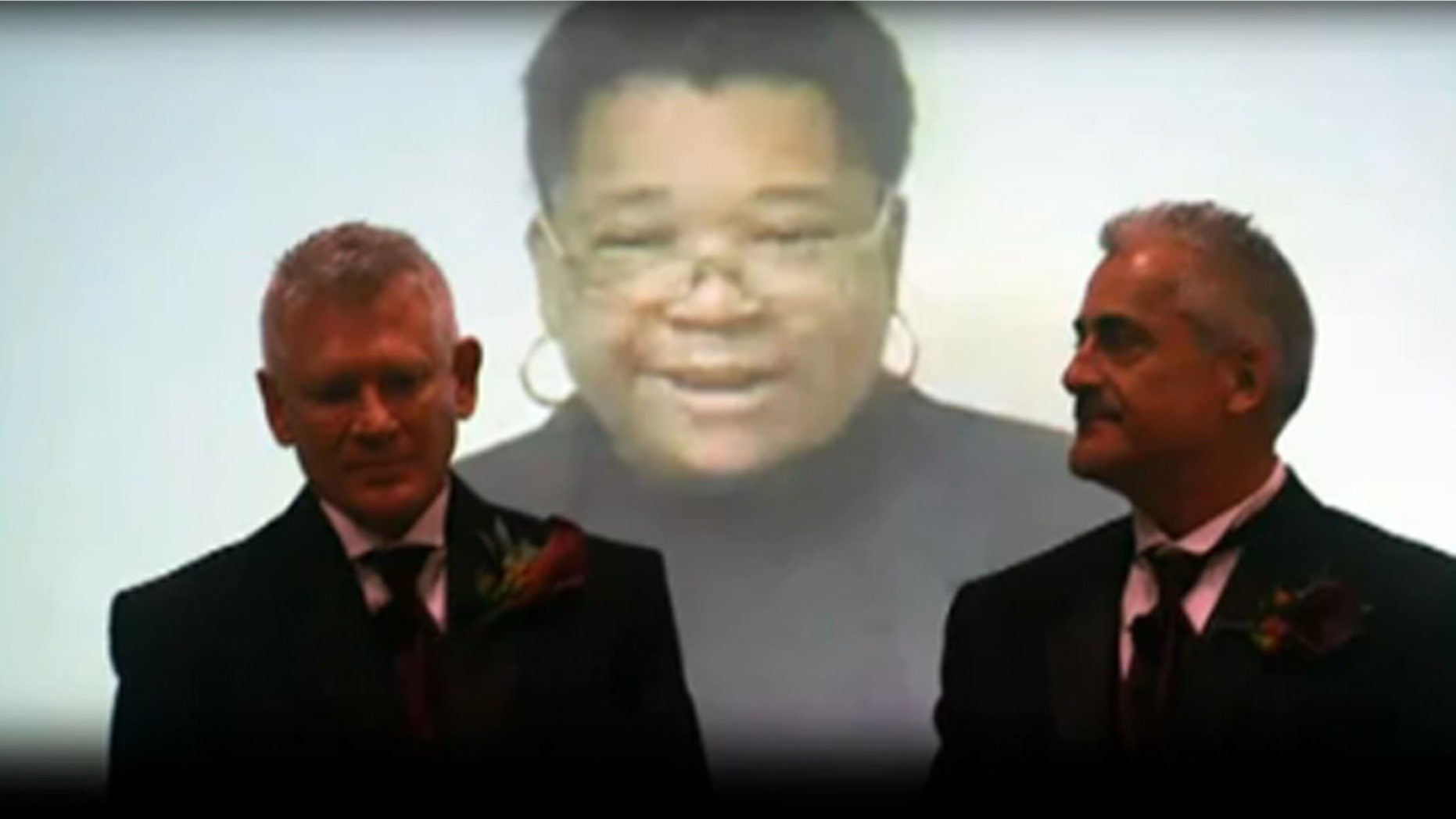 Shown here are Mark Reed, left, and Dante Walkup at their wedding ceremony Oct. 10. (Courtesy of Mark Reed)