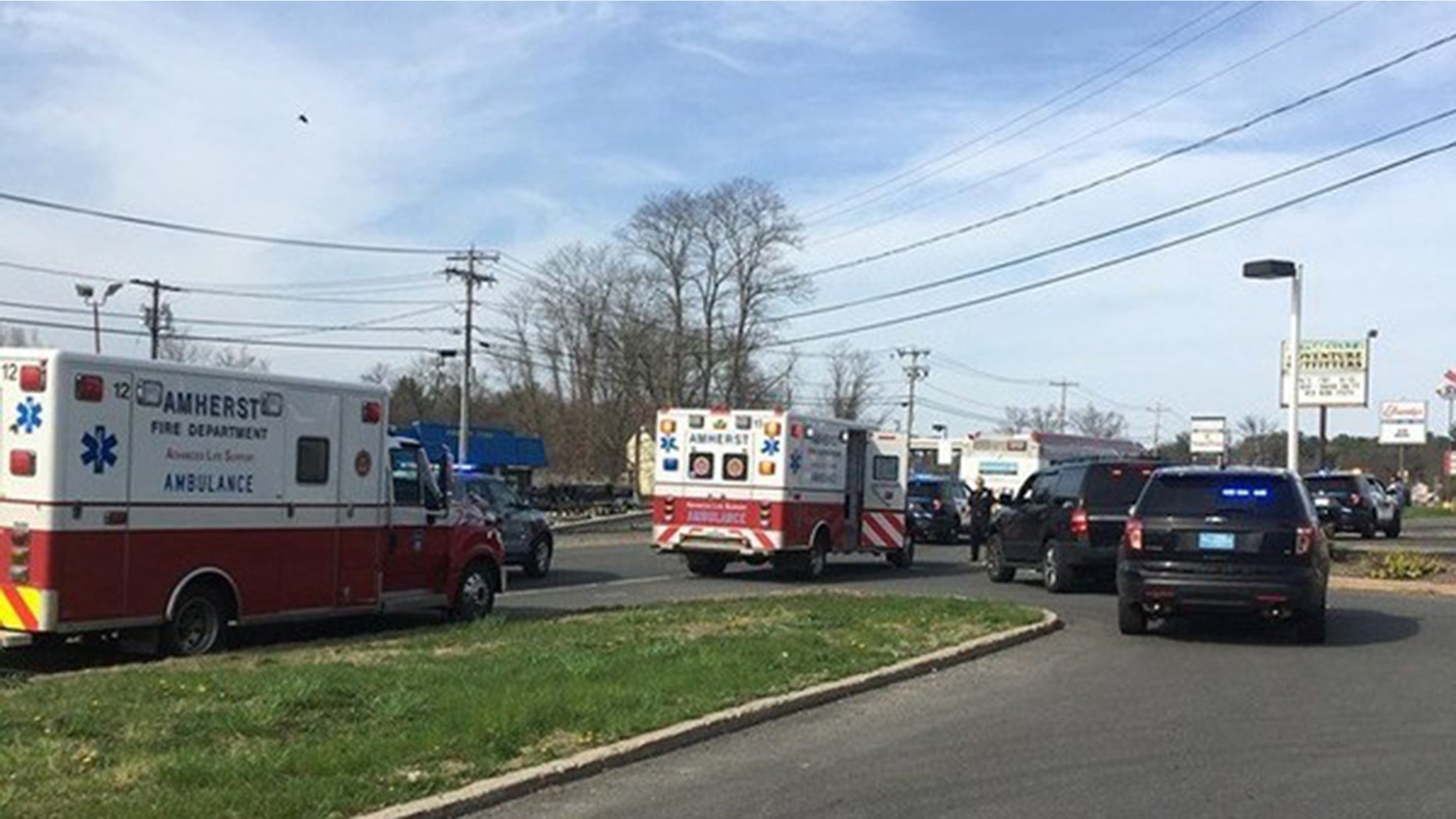 Police say a woman stabbed two people while riding on a Massachusetts bus.