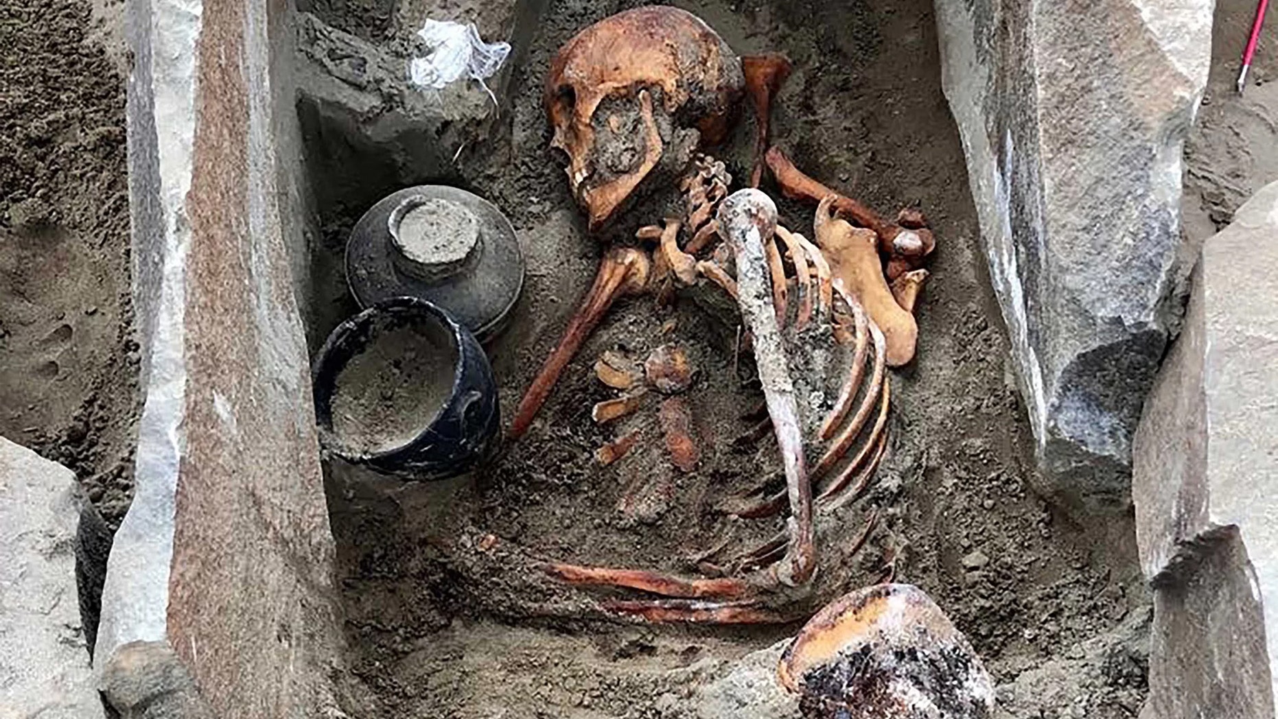 The 2,000-year-old mummy, dubbed Sleeping Beauty, was buried in silk clothes and a beaded belt with a jet buckle. Credit: Marina Kilunovskaya/The Siberian Times