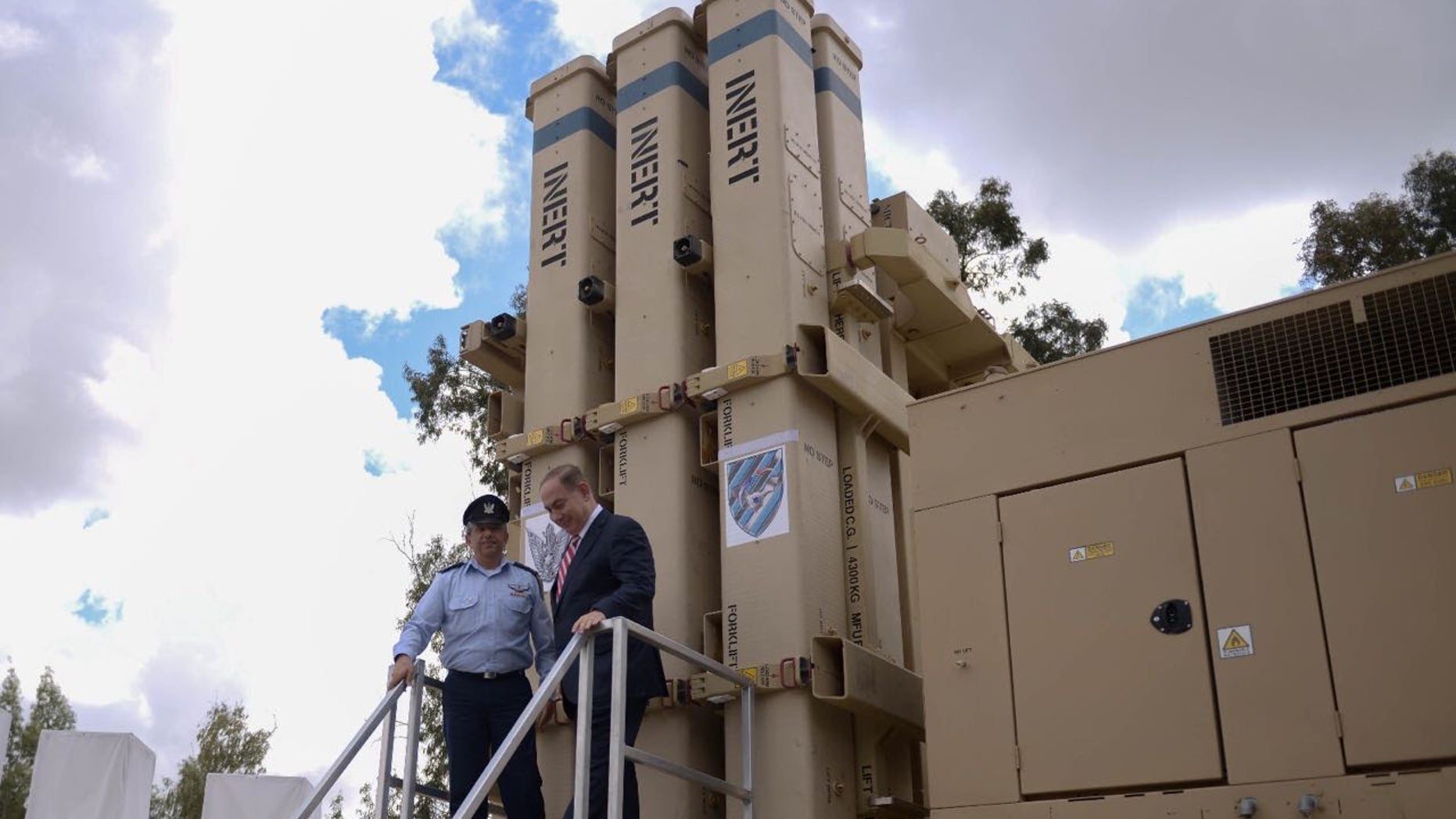 Israeli Prime Minister Benjamin Netanyahu (above, right) gets close to the David's Sling Air Defense System at the inauguration ceremony of the joint U.S.-Israeli missile interceptor at the Hatzor Air Base, Israel, on April 2, 2017. (CREDIT: Israel Defense Forces)