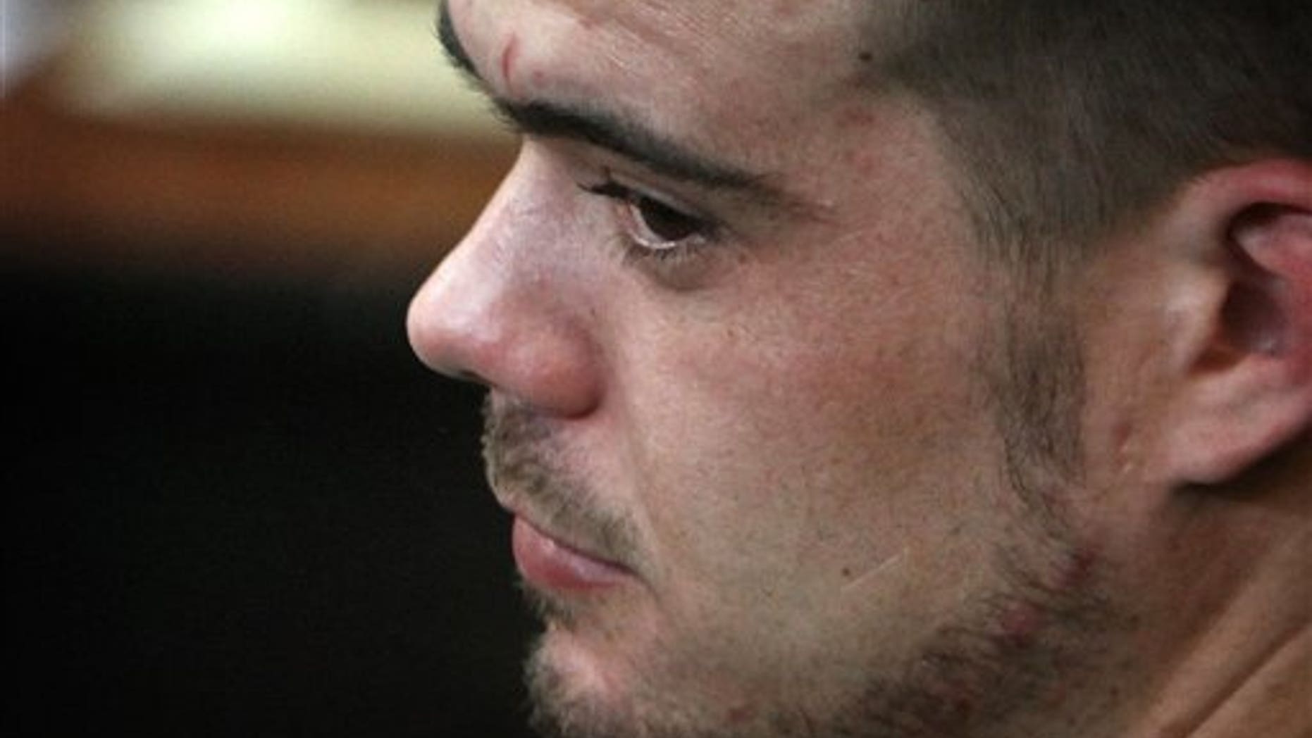 FILE - In this Jan. 13, 2012 file photo, Joran van der Sloot sits in the courtroom before his sentencing at San Pedro prison in Lima, Peru. Van der Sloot's lawyer, Maximo Altez, said Wednesday, May 14, 2014, the 26-year-old Dutchman and his Peruvian fiance have nearly completed legal arrangements to wed. He says the future Mrs. van der Sloot, Leydi Figueroa, is five months pregnant with a boy. (AP Photo/Karel Navarro, File)
