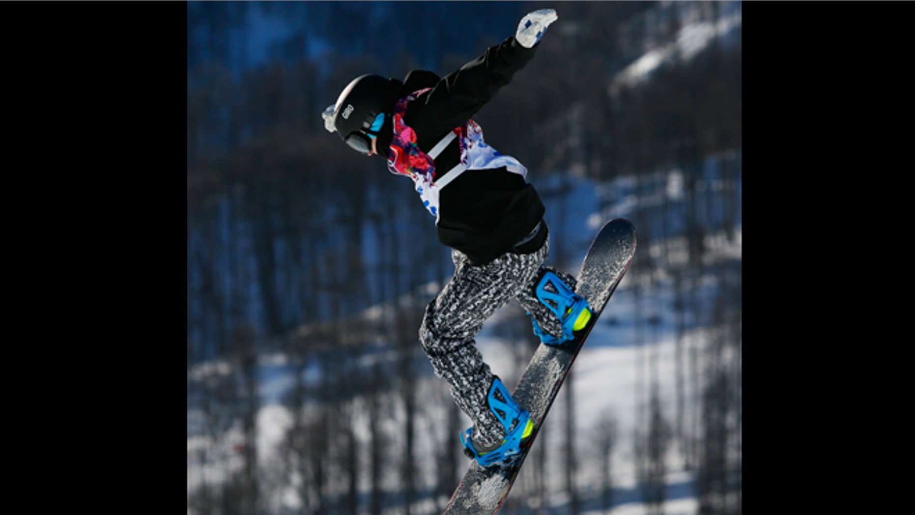 Feb. 6, 2014: Finland's Peetu Piiroinen takes a jump during men's snowboard slopestyle qualifying at the Rosa Khutor Extreme Park ahead of the 2014 Winter Olympics in Krasnaya Polyana, Russia.
