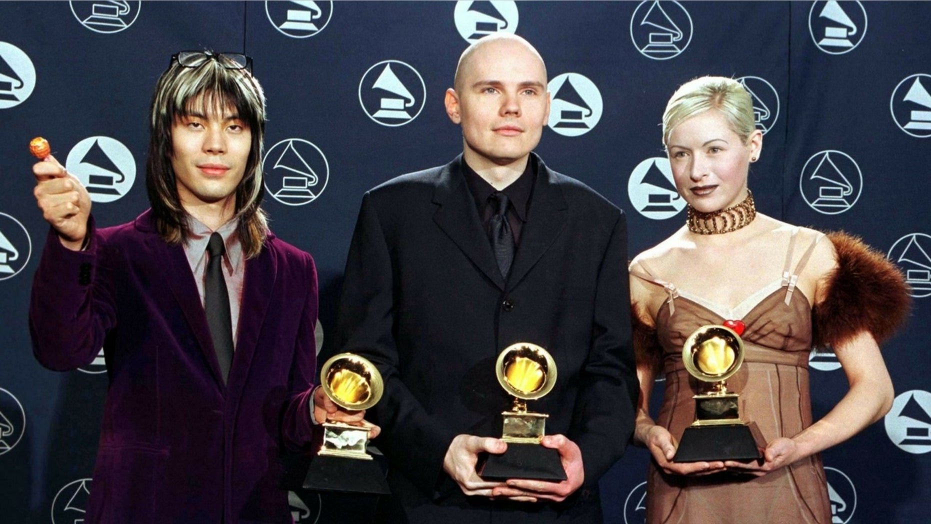 D’arcy Wretzky (right) claims she was not invited to The Smashing Pumpkins reunion.