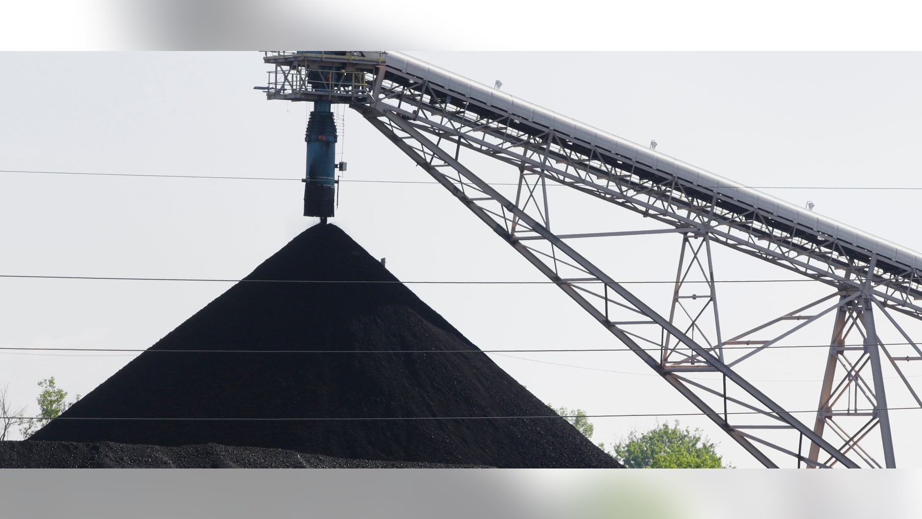June 2, 2014: A hill of coal is seen at the North Omaha Station, a coal-burning power station, in Omaha, Neb.
