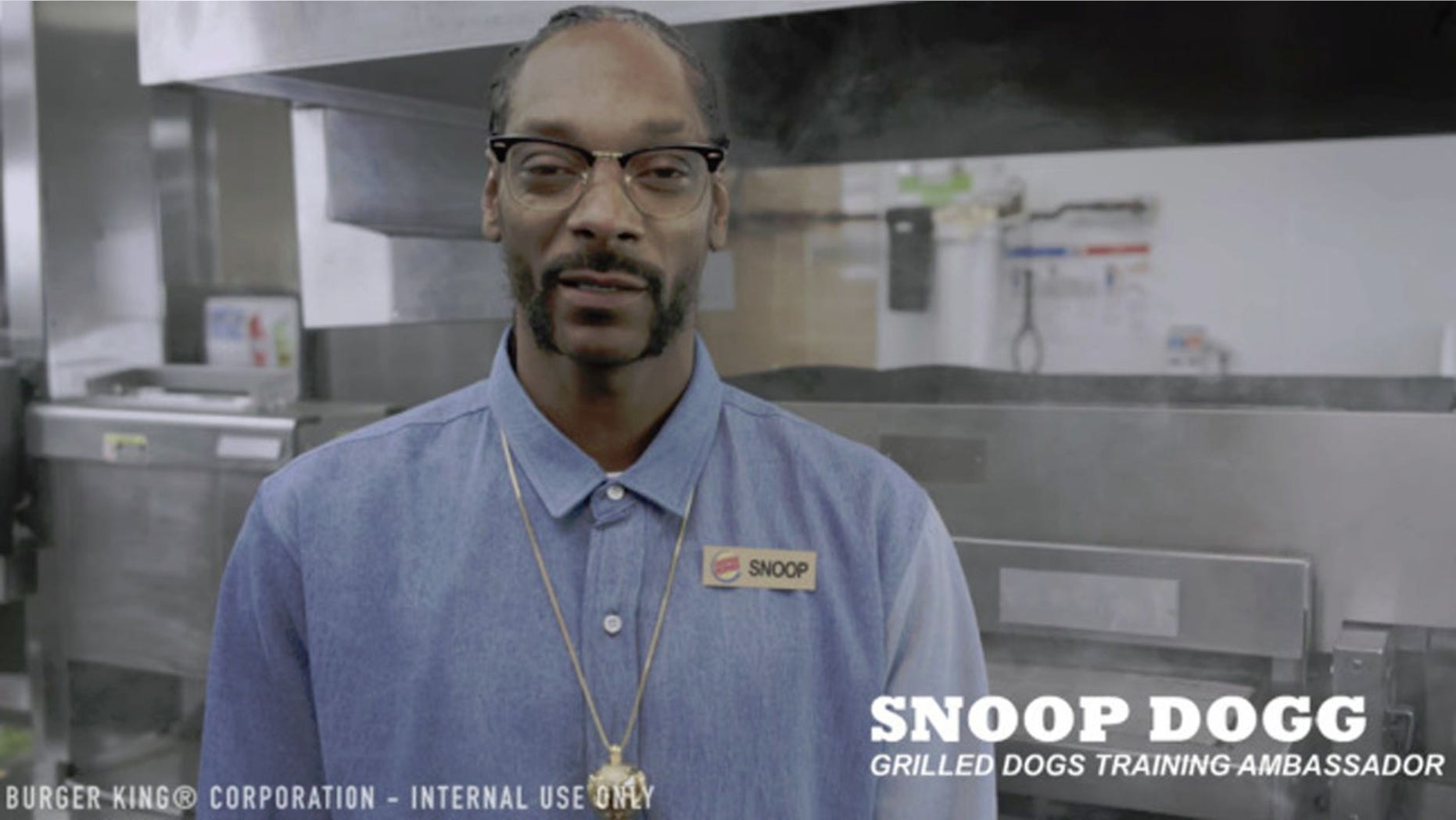 Snoop Dogg teaches Burger King staff how to grill up dogs his way.