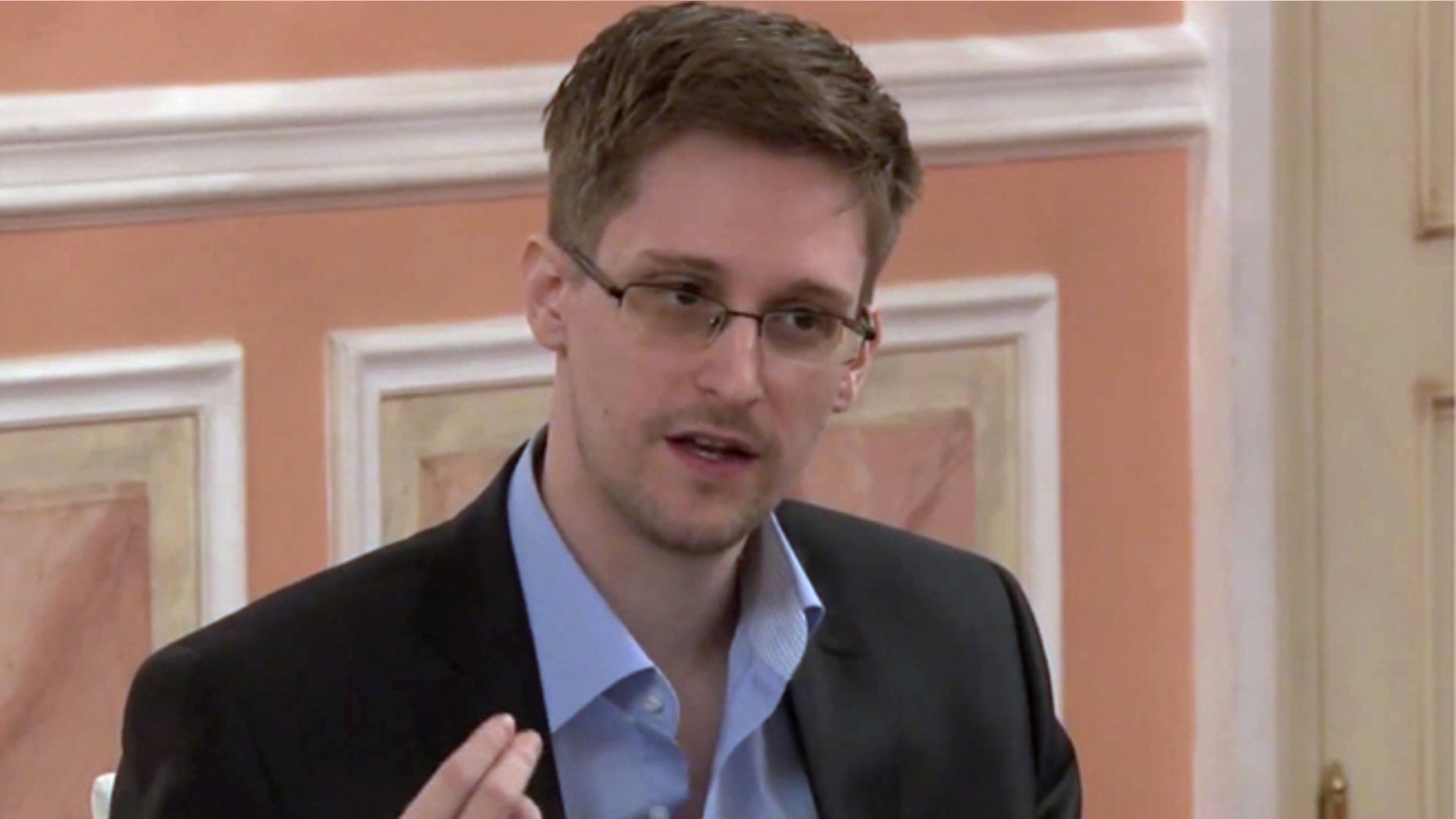 In this undated image made from video released by WikiLeaks, former National Security Agency systems analyst Edward Snowden speaks during a presentation ceremony for the Sam Adams Award in Moscow, Russia.