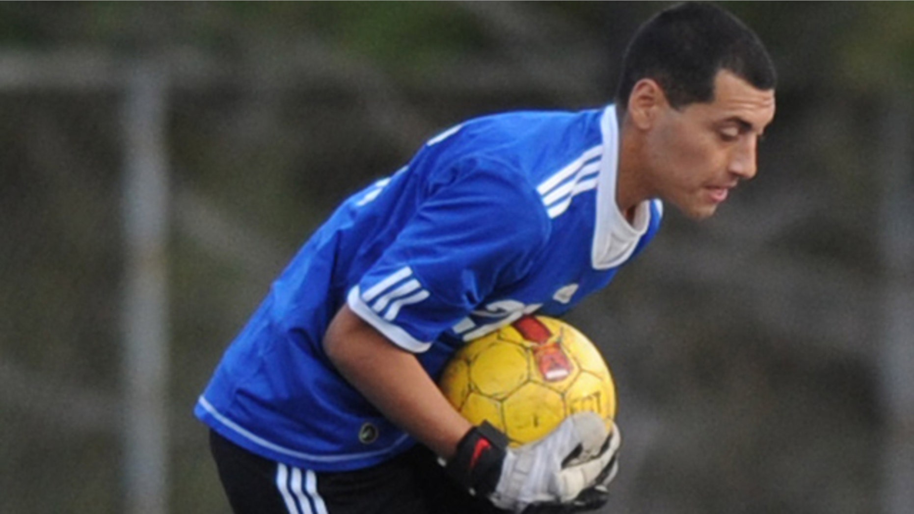 Jan. 11, 2012: This photo shows El Camino Real's goalkeeper Francisco Rodriguez scooping up the ball against Taft, at an El Camino High School soccer game in Los Angeles. Rodriguez, a high school soccer player was lured outside his Los Angeles home on Jan. 11, and shot to death shortly after this game between two San Fernando Valley schools.