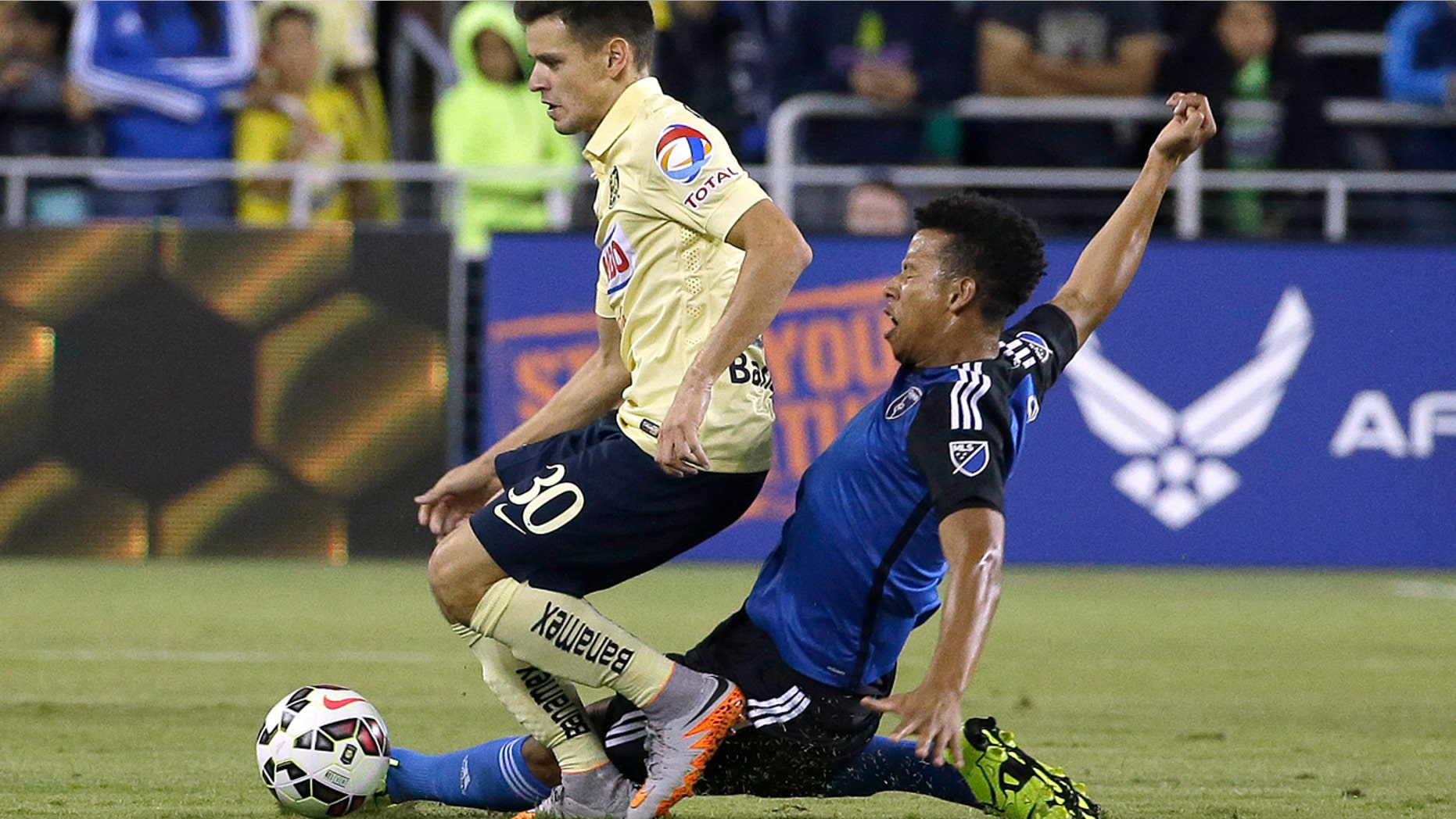 In this July 14, 2015, file photo, Jose Earthquakes midfielder Matheus Silva, right, challenges Club America forward Alejandro Diaz (30) for the ball during the second half of an International Champions Cup soccer match in San Jose, Calif.