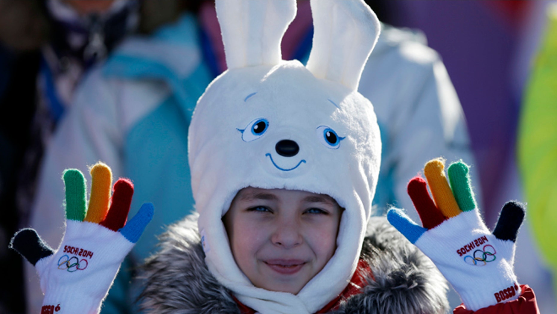 Feb. 6, 2014: A girl wears a hat in the shape of the Sochi Winter Olympics mascot while watching the men's snowboard slopestyle qualifying at the Rosa Khutor Extreme Park ahead of the 2014 Winter Olympics in Krasnaya Polyana, Russia.