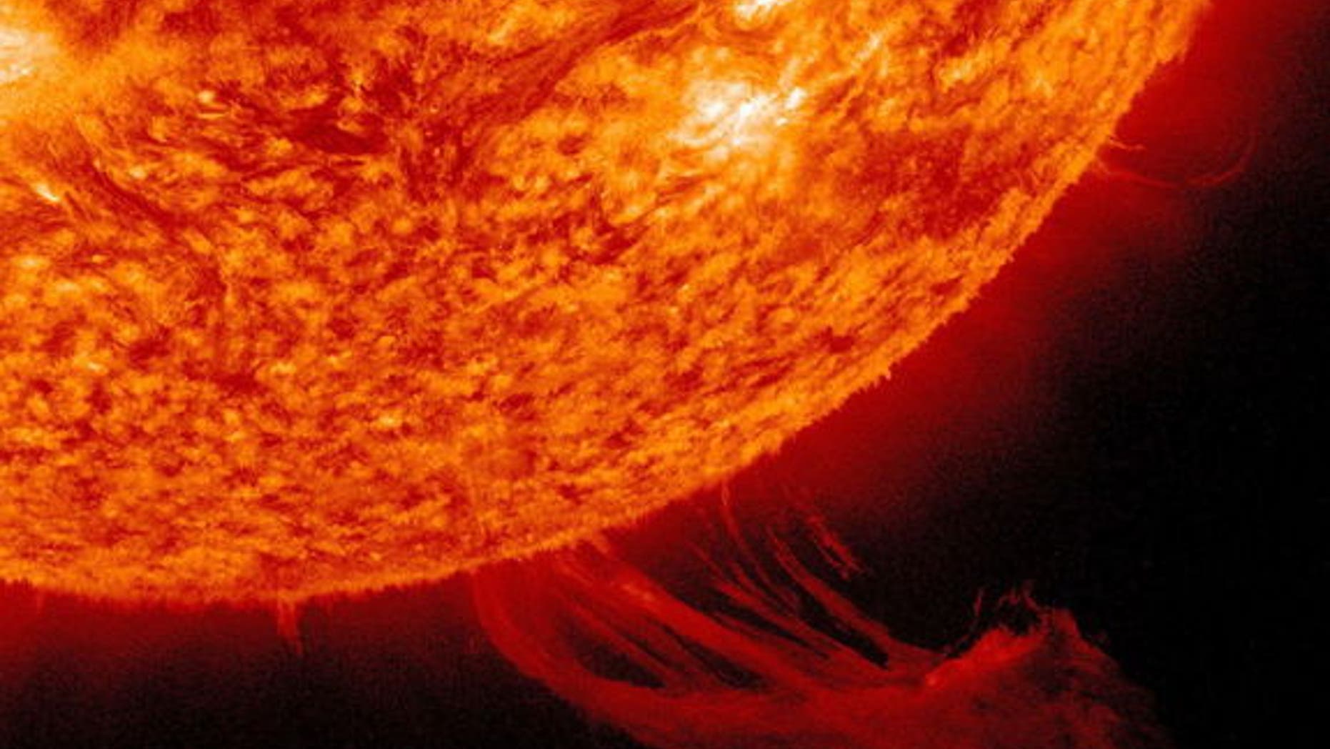A solar prominence rose up and swept away from the sun as captured in this image at 4:15 a.m. EDT on Oct. 19, 2012.