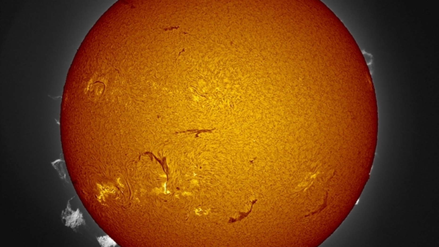 Amateur astronomer Jim Lafferty captured this photo of three solar prominences erupting on the sun on July 28, 2012 from Redlands, Calif.