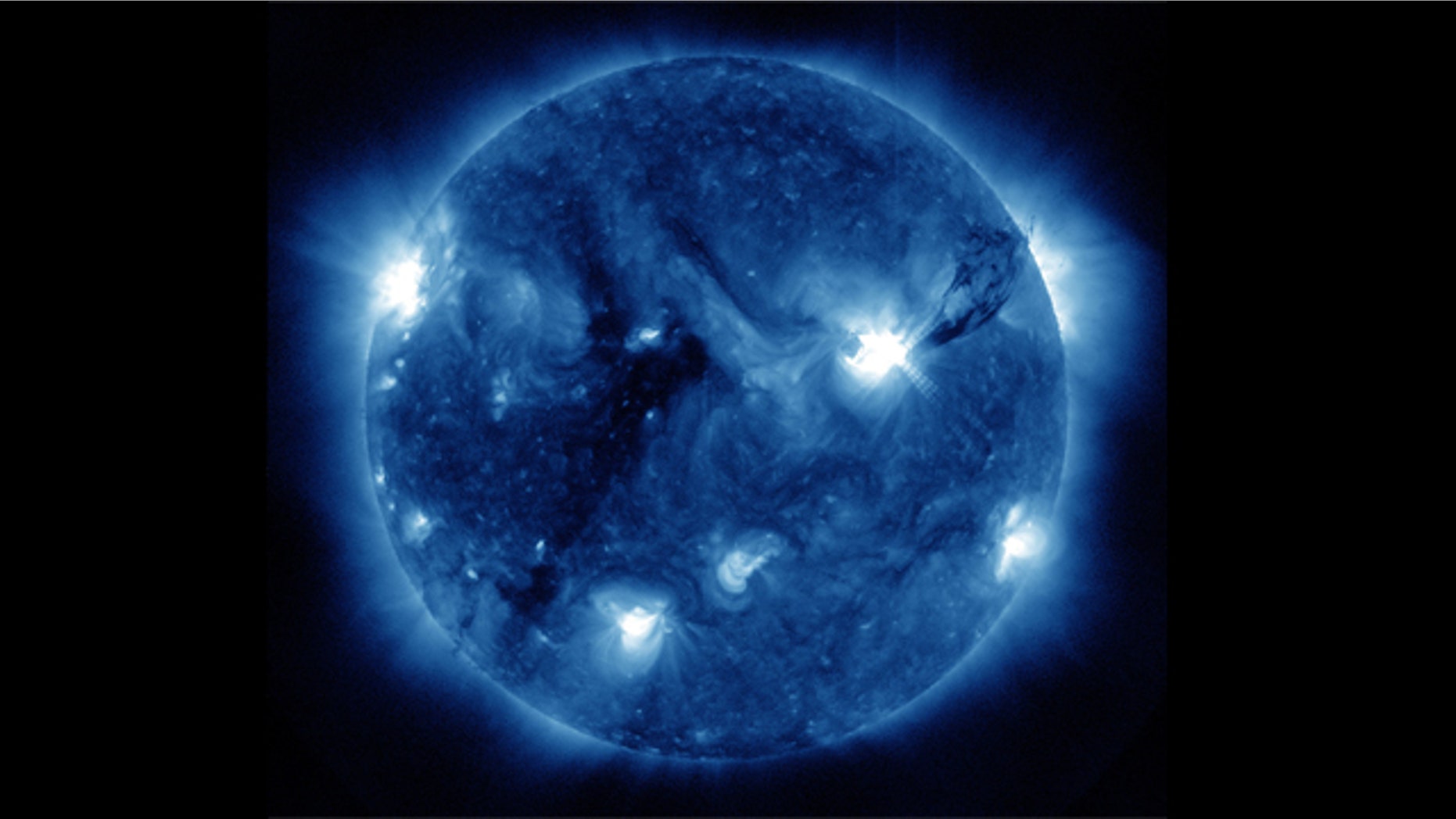 A giant plume of ionized gas called plasma (to the right) leaps off the sun from sunspot 1283 in this photo snapped by NASA's Solar Dynamics Observatory. This sunspot spouted four solar flares and three coronal mass ejections from Sept. 6-8, 2011