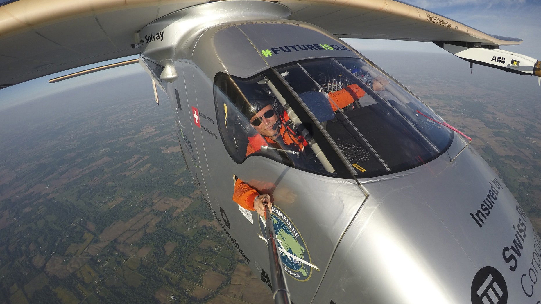 File photo - Bertrand Piccard takes a selfie on board the "Solar Impulse 2" during his flight from Dayton, Ohio to Lehigh Valley International Airport in Allentown, Pa., where he landed, Wednesday, May 25 2016. (Bertrand Piccard/Solar Impulse via AP)