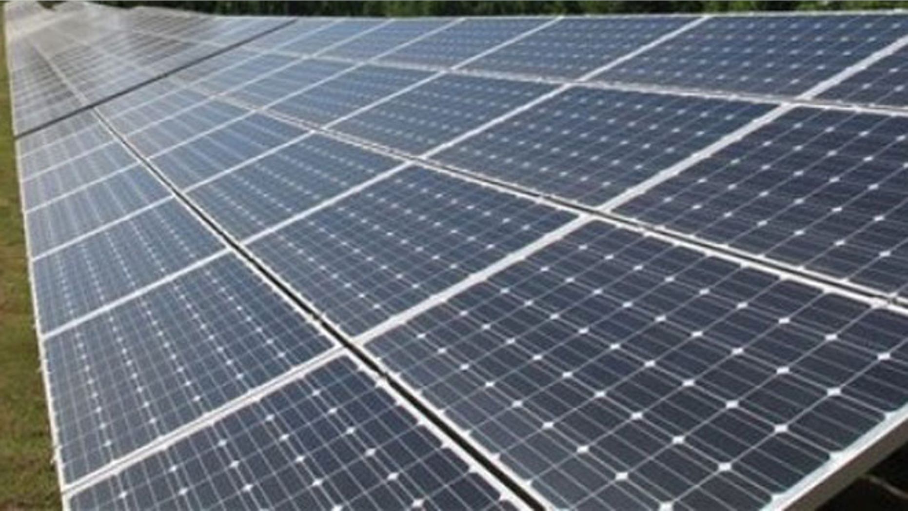 This April 12, 2012, file photo shows panels containing solar cells at a Solar Farm in Tennessee.
