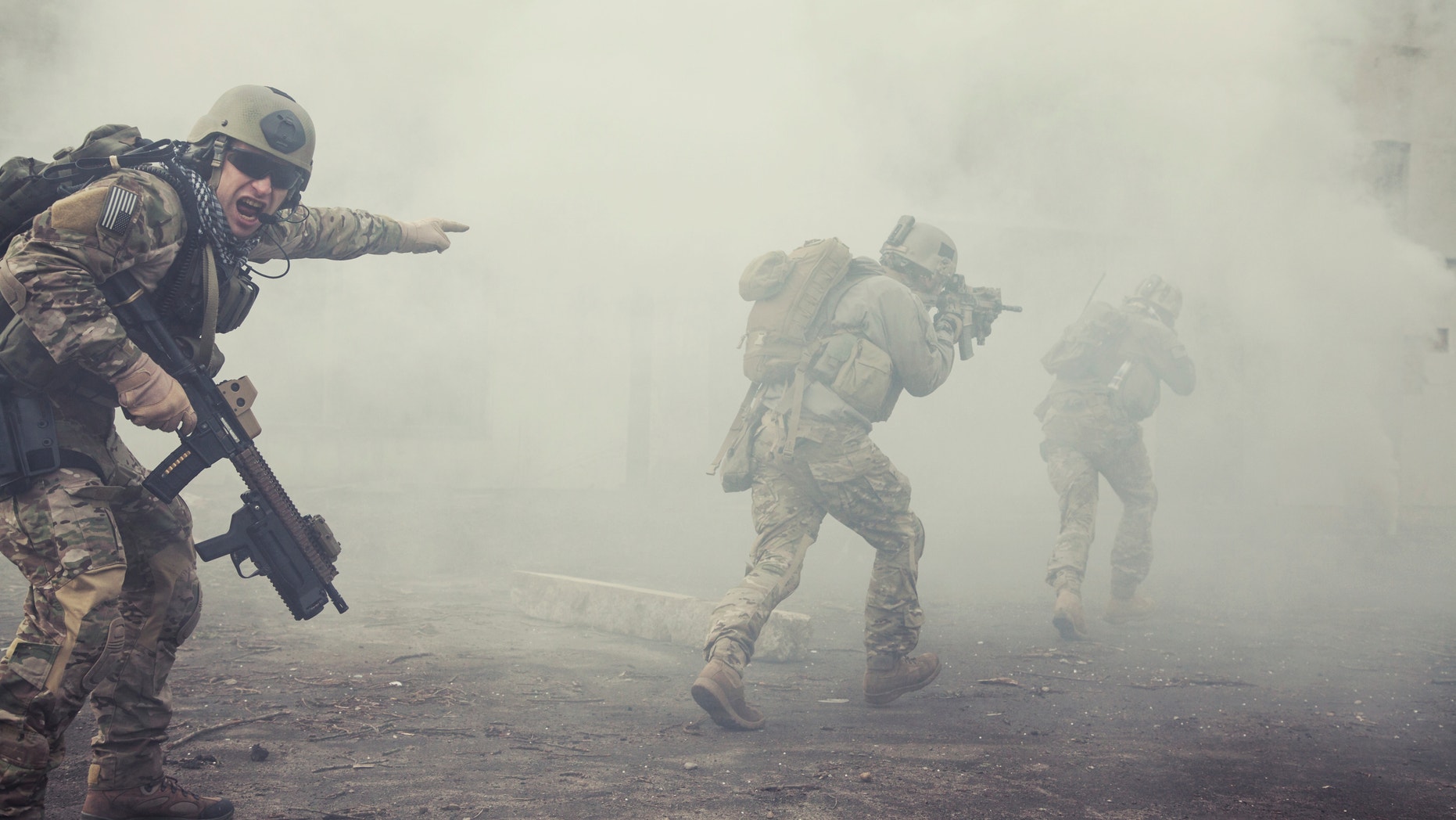 United States Army rangers during the military operation in the smoke and fire
