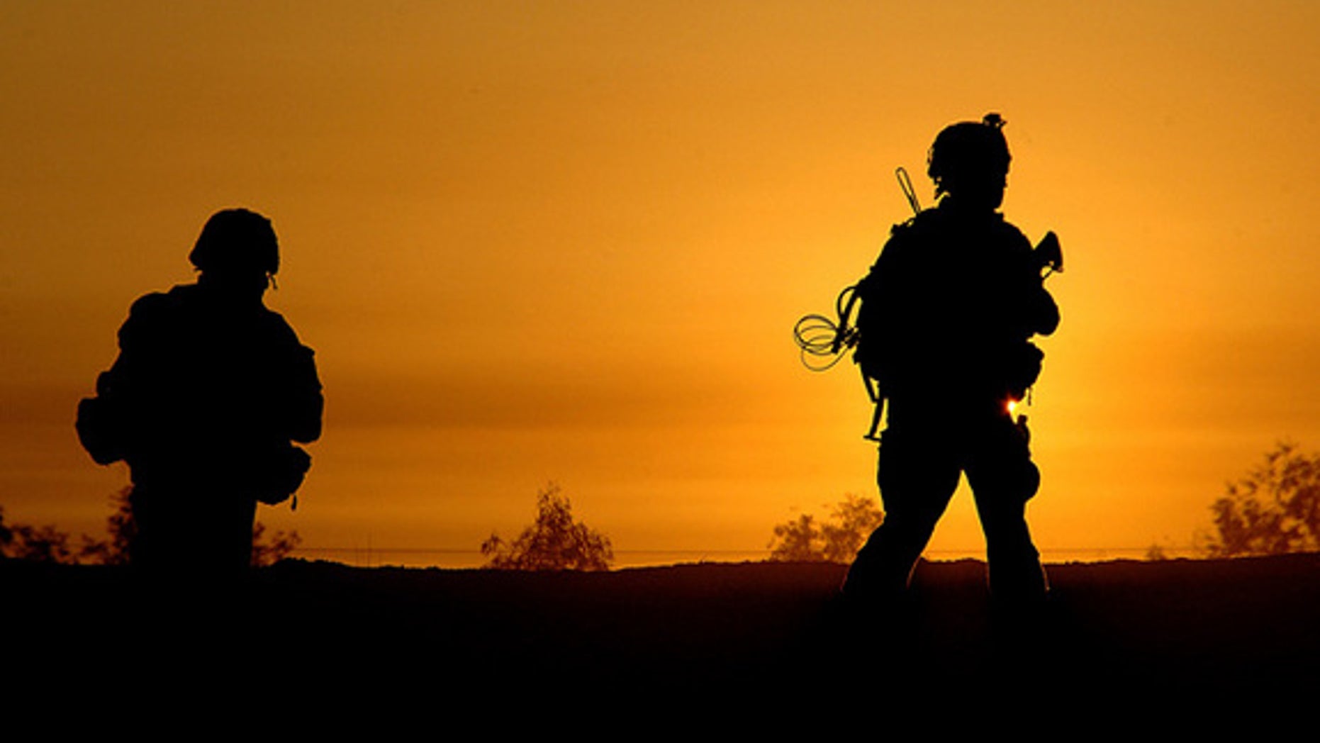 U.S. Army Soldiers from the 2nd Brigade Combat Team, 3rd Infantry Division cross a bridge to Al Zunbria, Iraq, Dec. 29, 2007, during operations to secure the area south of their area of operation.