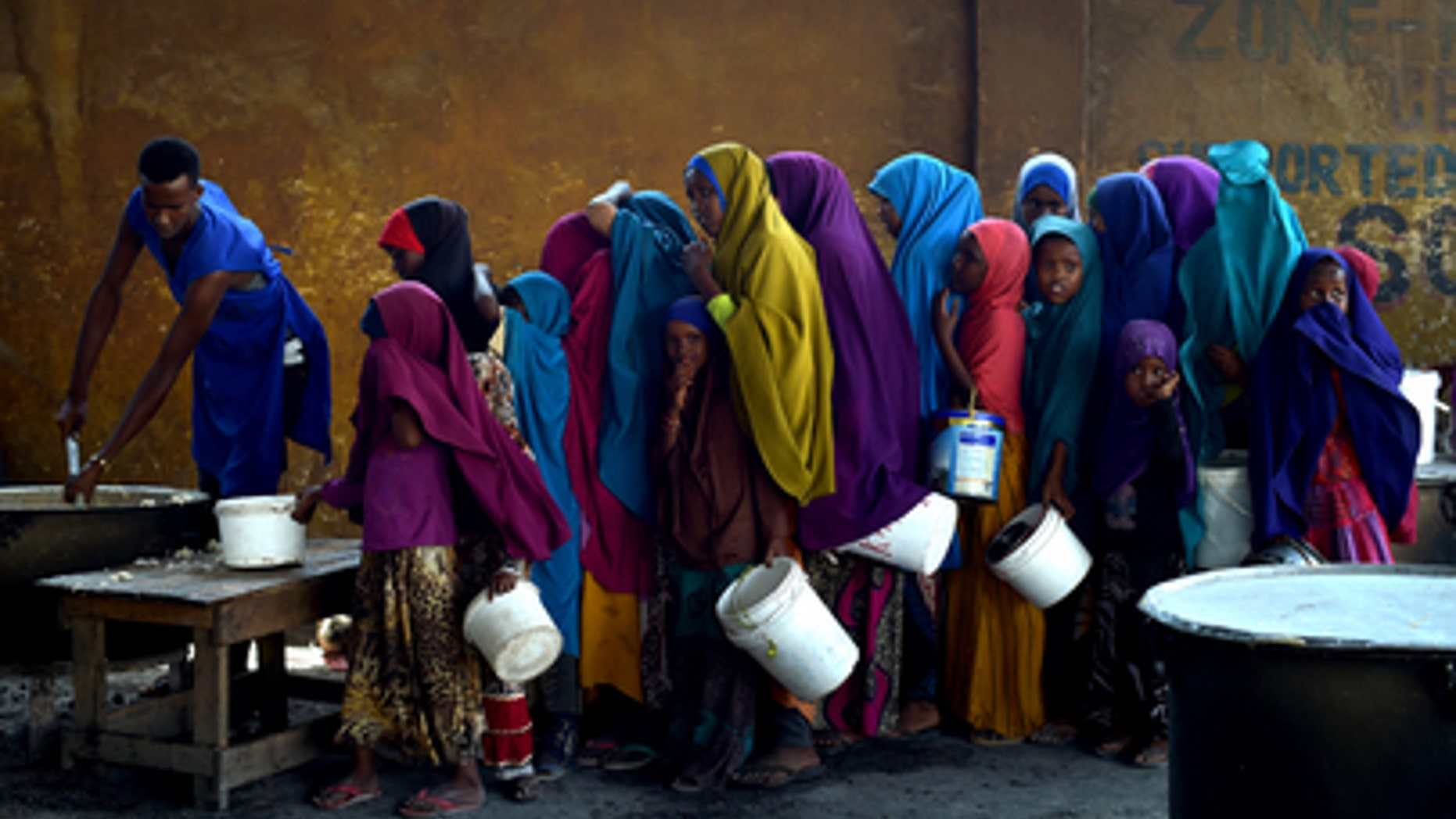 Somali girls line up in March 2017 at a feeding center in Mogadishu, where a severe drought could put 5.5 million people at risk for famine.