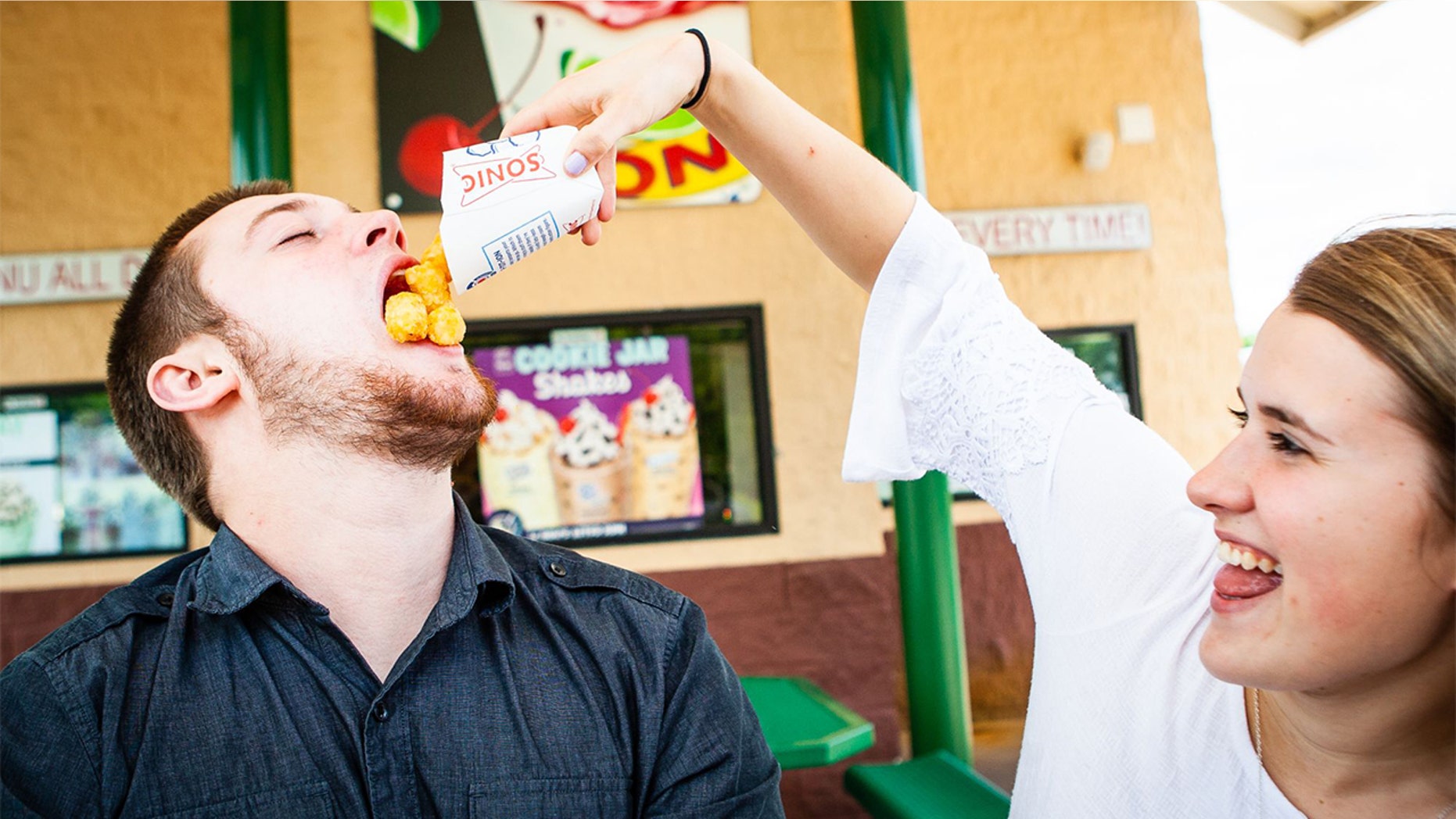 A couple who met and fell in love while working at Sonic took their engagement photos at the fast-food chain.