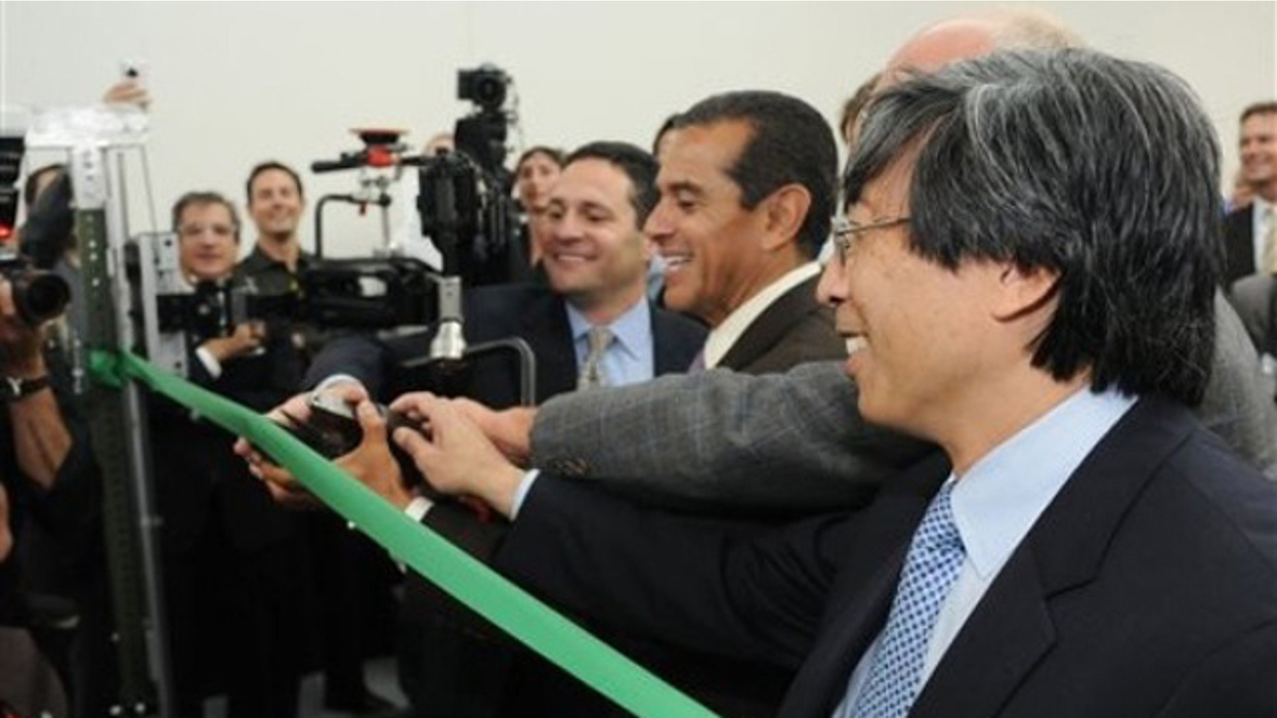 June 8, 2011: Dr. Patrick Soon-Shiong, right, is seen at an event for a new heavy aerospace cutting tool in Los Angeles.