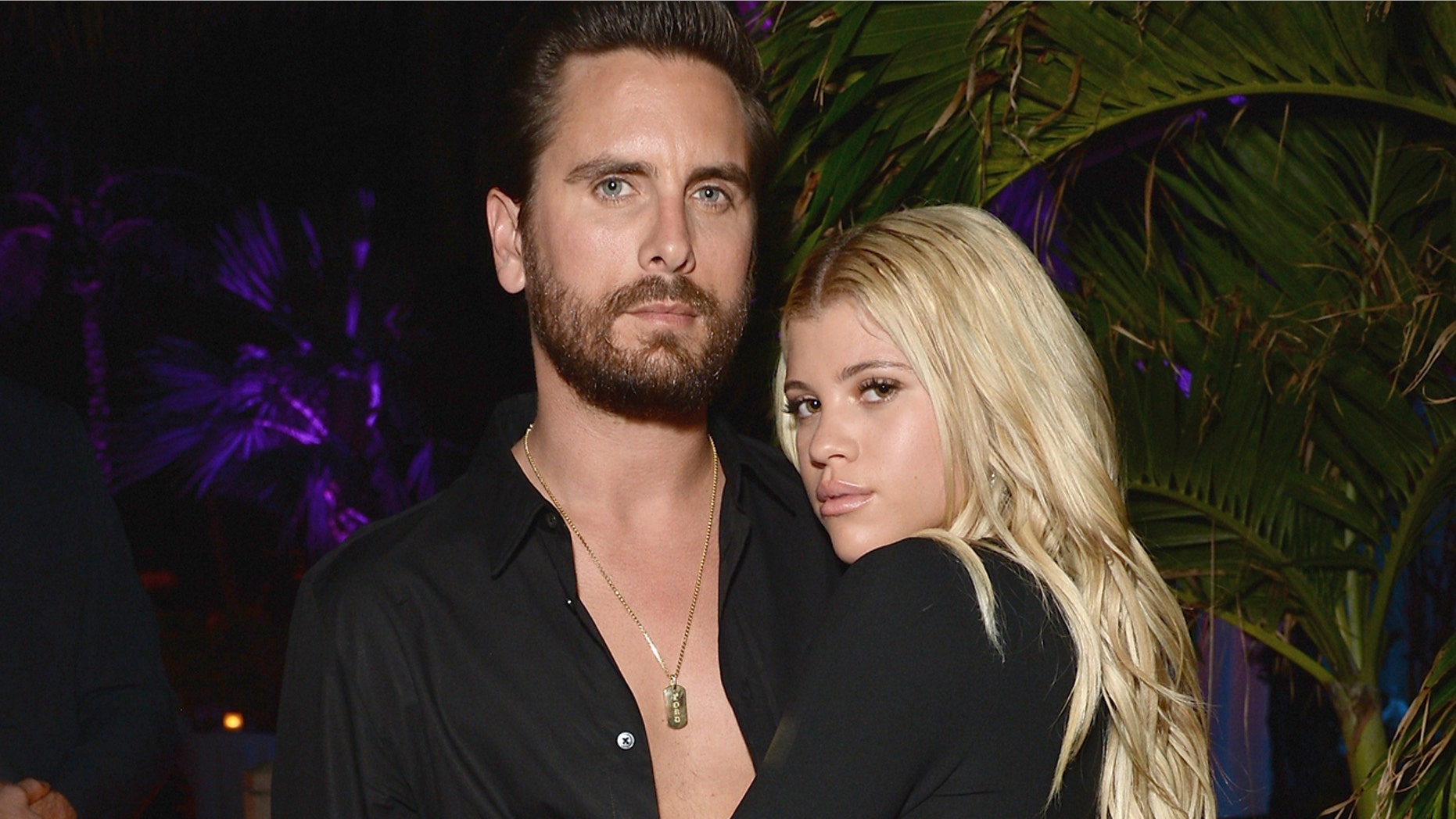 Lionel Richie's daughter Sofia Richie awkwardly answers questions about boyfriend Scott Disick during interview.