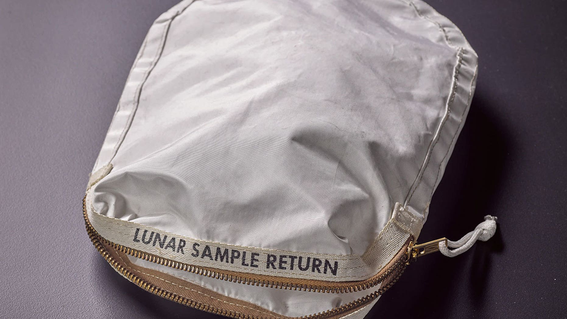 Sotheby's will auction a moon dust-stained Apollo 11 lunar sample return bag, which the firm estimates will sell for $2 to $4 million, on Thursday, July 20, 2017 in New York.
