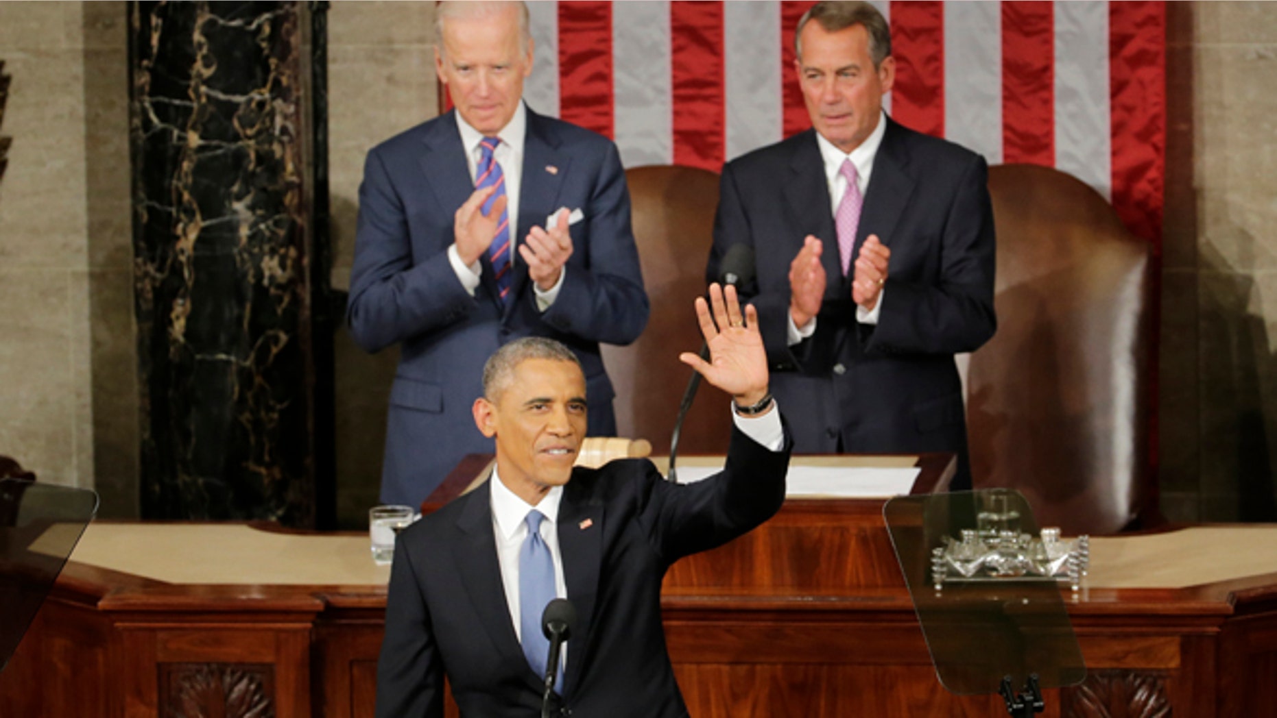 Jan. 20, 2015: President Barack Obama waves before giving his State of the Union address before a joint session of Congress on Capitol Hill in Washington. (AP)