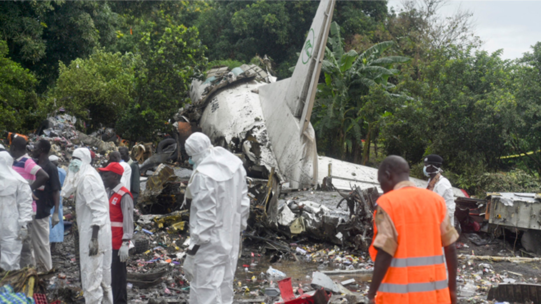 Nov. 4, 2015: Responders pick through the wreckage of a cargo plane which crashed in the capital Juba, South Sudan. The cargo plane was taking off from the South Sudanese capital of Juba when it crashed along the banks of the Nile River, killing dozens according to witnesses and the government.
