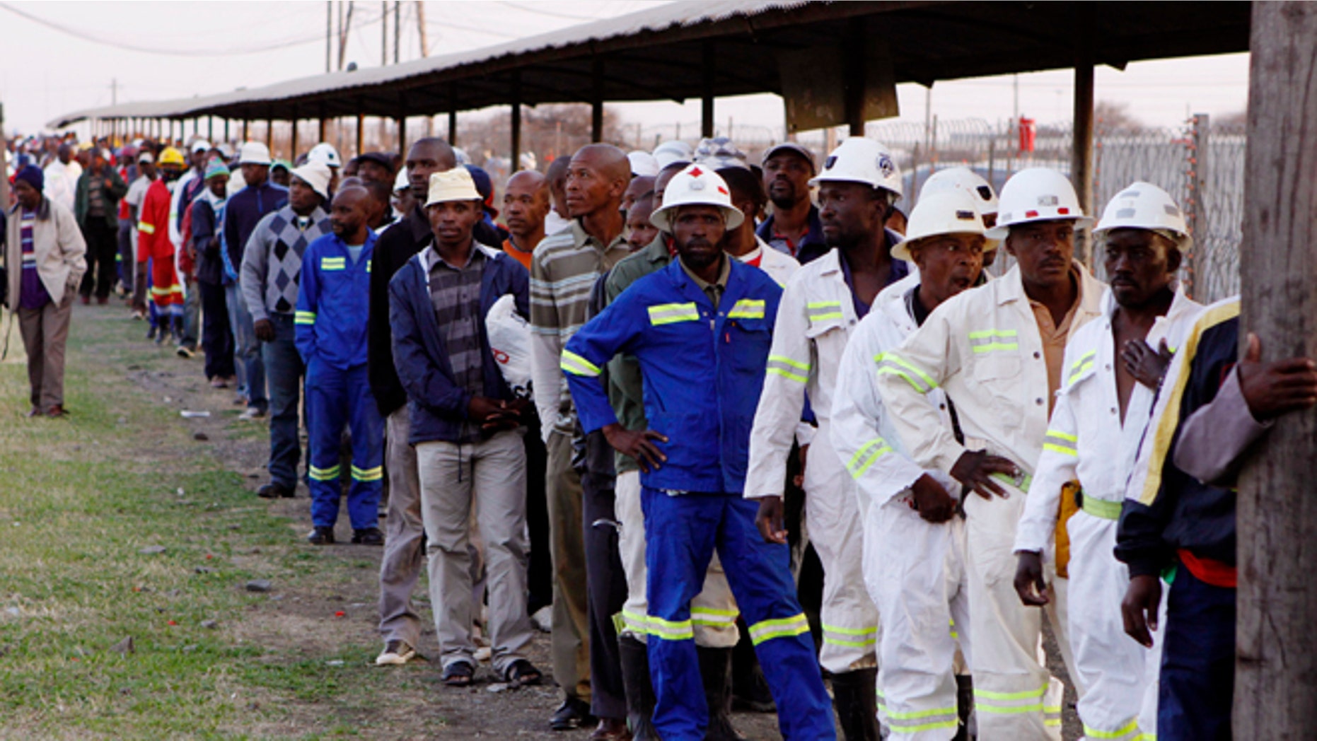 Sept. 20, 2012: Miners return to work at the Lonmin Platinum mine after Lonmin resolved a five-week strike by agreeing to pay raises of up to 22 percent, in Marikana, Rustenburg, South Africa.