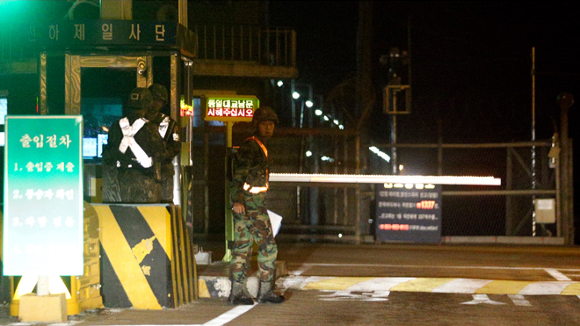 Oct. 6, 2012: South Korean soldiers stand guard at a traffic control gate near the truce village of Panmunjom, in the demilitarized zone that separates the two Koreas, in Paju, north of Seoul, South Korea.