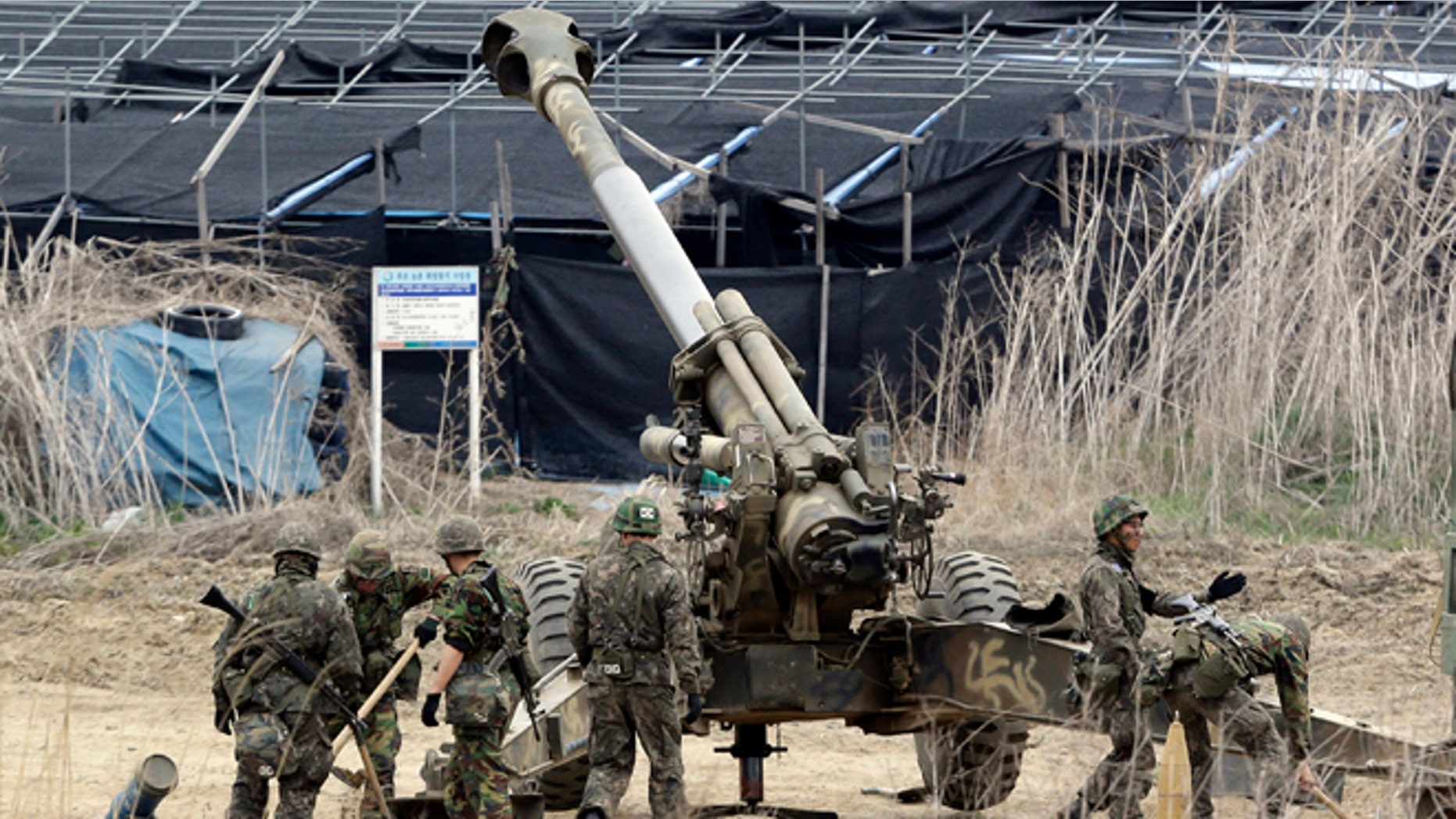 April 18, 2013: South Korean soldiers prepare 155 mm howitzers during their military exercise in the border city between two Koreas, Paju, north of Seoul, South Korea. North Korea on Thursday demanded the withdrawal of U.N. sanctions and the end of U.S.-South Korea military drills as conditions for resuming talks meant to defuse tension on the Korean Peninsula.