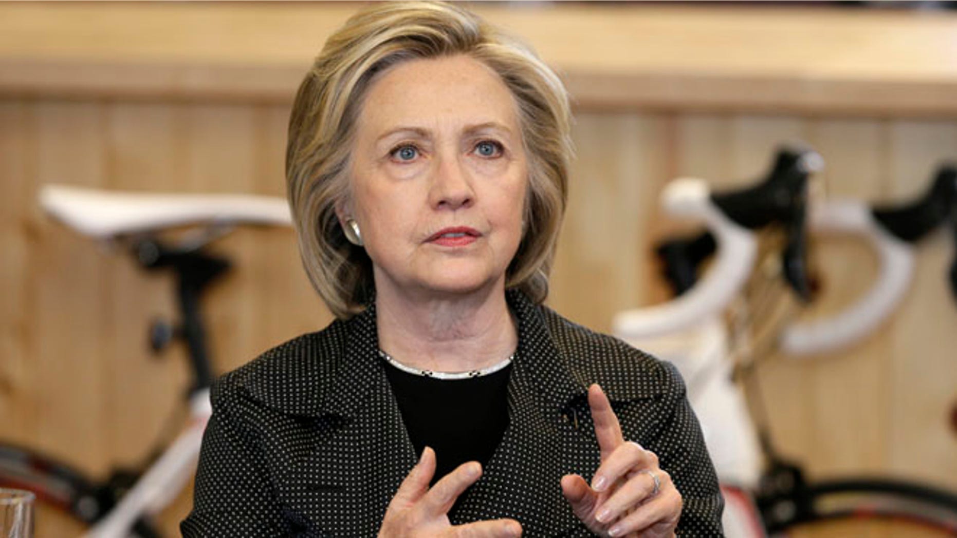 May 19, 2015: Democratic presidential candidate Hillary Rodham Clinton speaks to small business owners at the Bike Tech cycling shop.