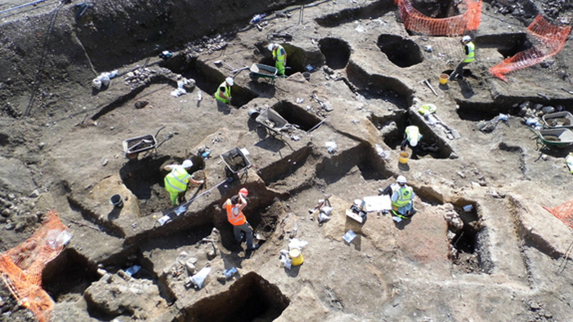 Archaeologists excavate large areas of medieval and post-medieval pitting in the backyards of properties running along Southgates.
