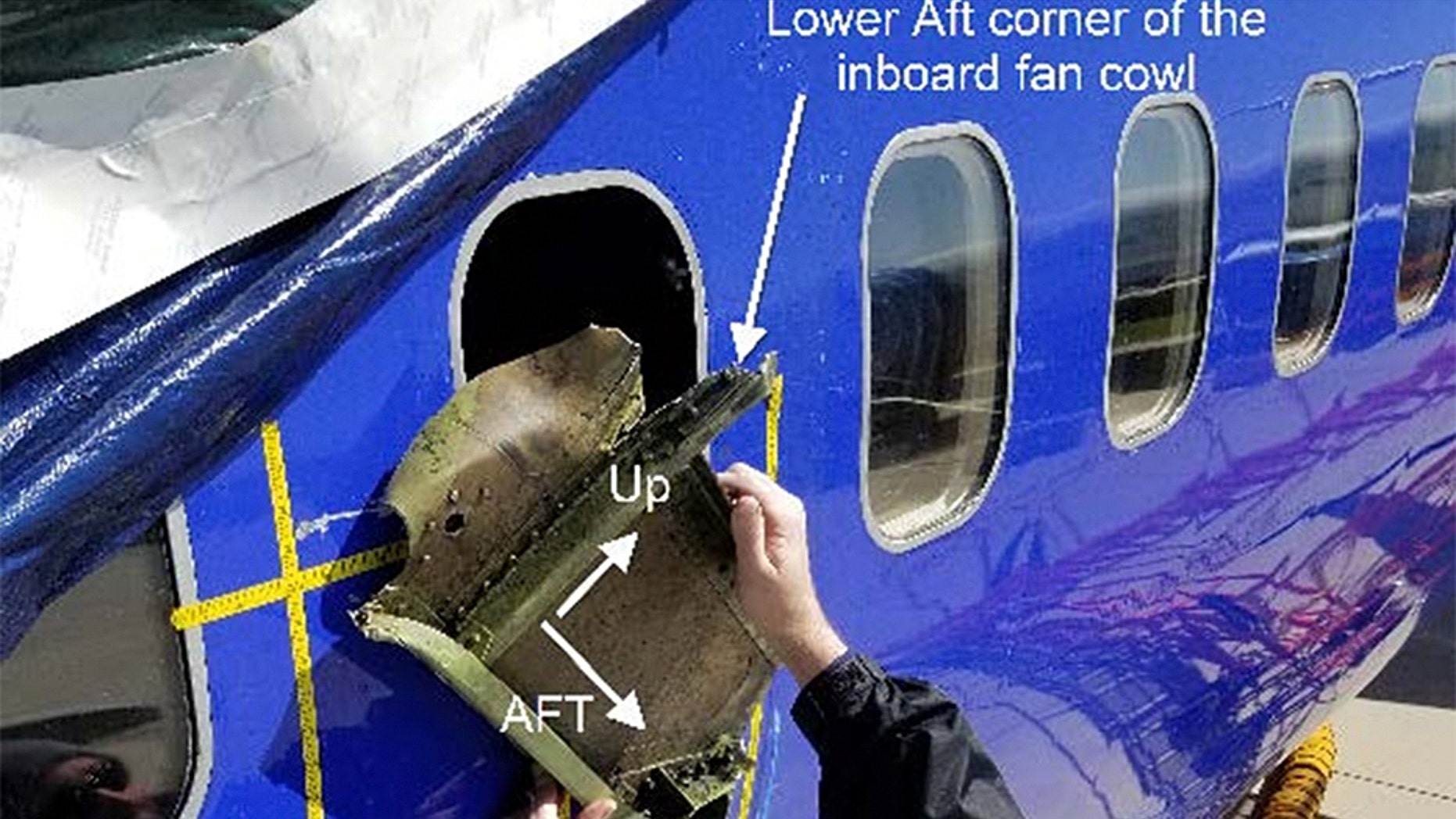 The National Transportation Safety Board's findings show, among other things, a gouge near the plane's shattered window "consistent in shape to a recovered portion of fan cowl and latching mechanism.