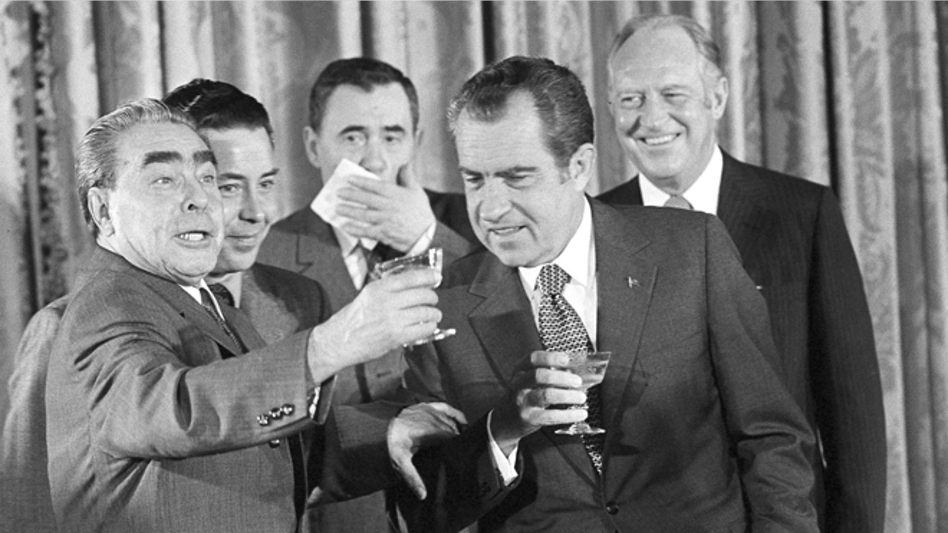 In this June 19, 1973 file photo, Soviet party chief Leonid I. Brezhnev, left, proposes a toast at the State Department in Washington after signing of the U.S.-Soviet cooperative agreements. Others from left, interpreter Viktor Sukhodrev, Russian Foreign Minister Andrei Gromyko, President Nixon and Secretary of State William F. Rogers. Viktor Sukhodrev, the Soviet interpreter who for three decades brought the words of Kremlin leaders to the English-speaking world died in Moscow on Friday May 16, 2014 at the age of 81.