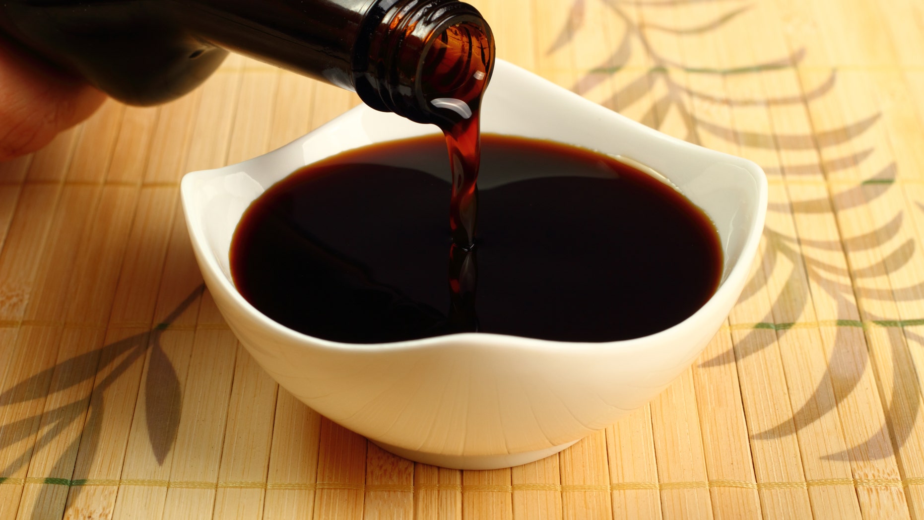 Pouring Soy Sauce into bowl